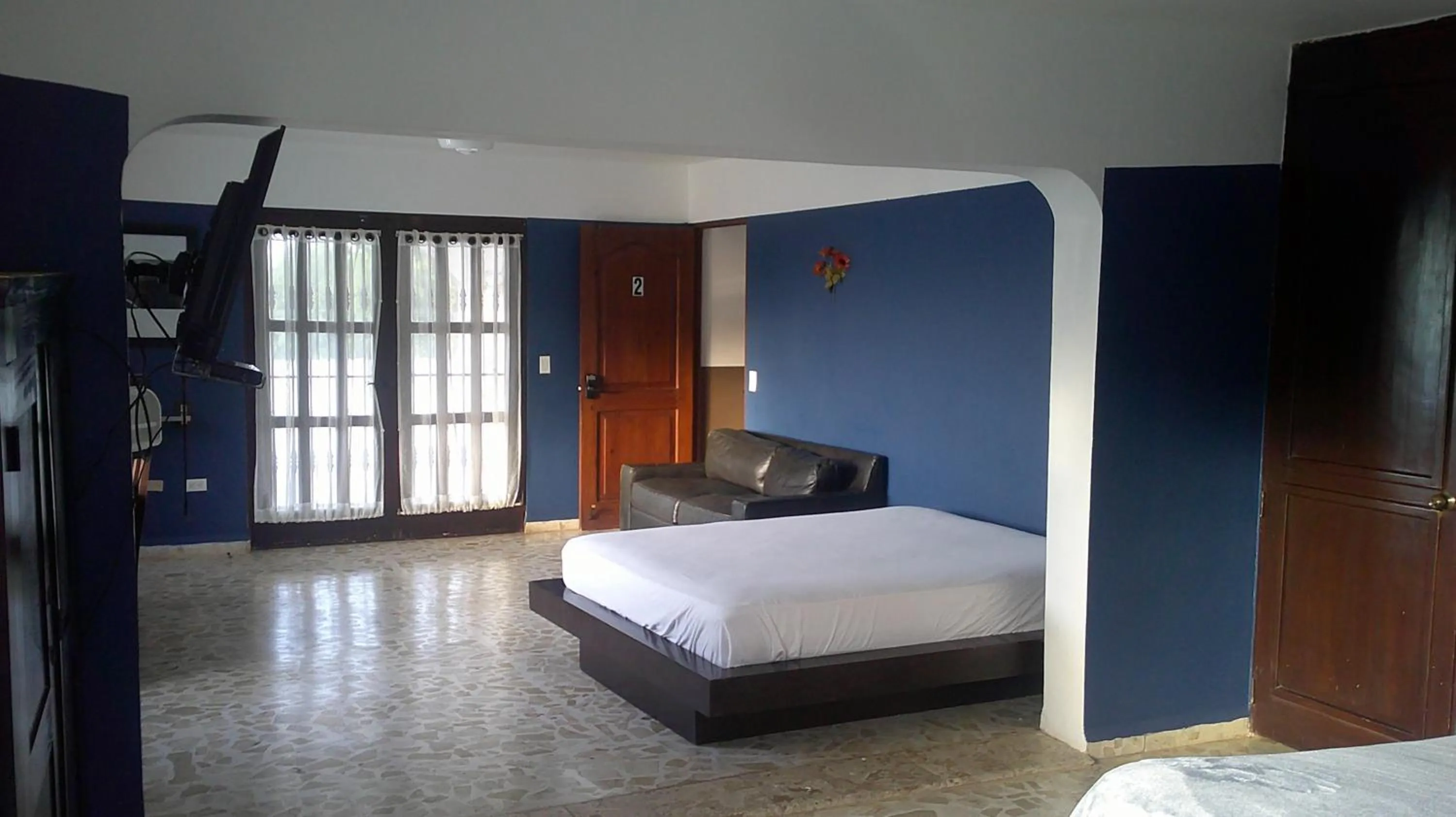 Bed in E&J Boutique Residences