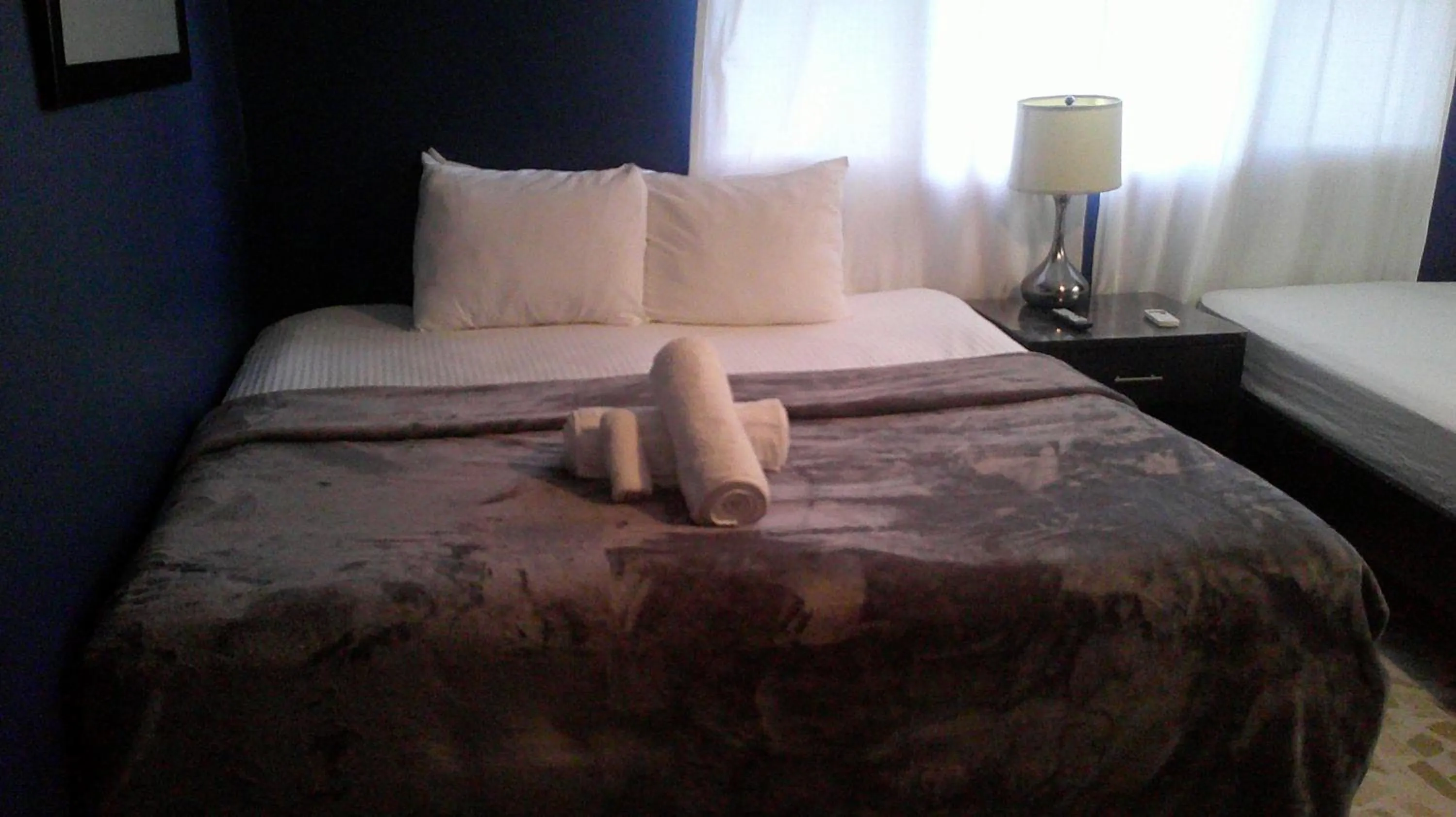 Bed in E&J Boutique Residences