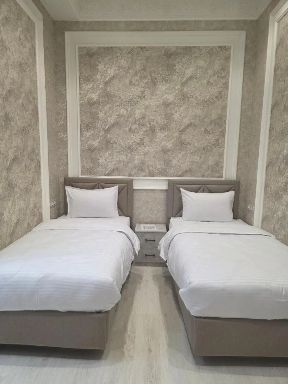 Bed in Old City Samarkand Hotel