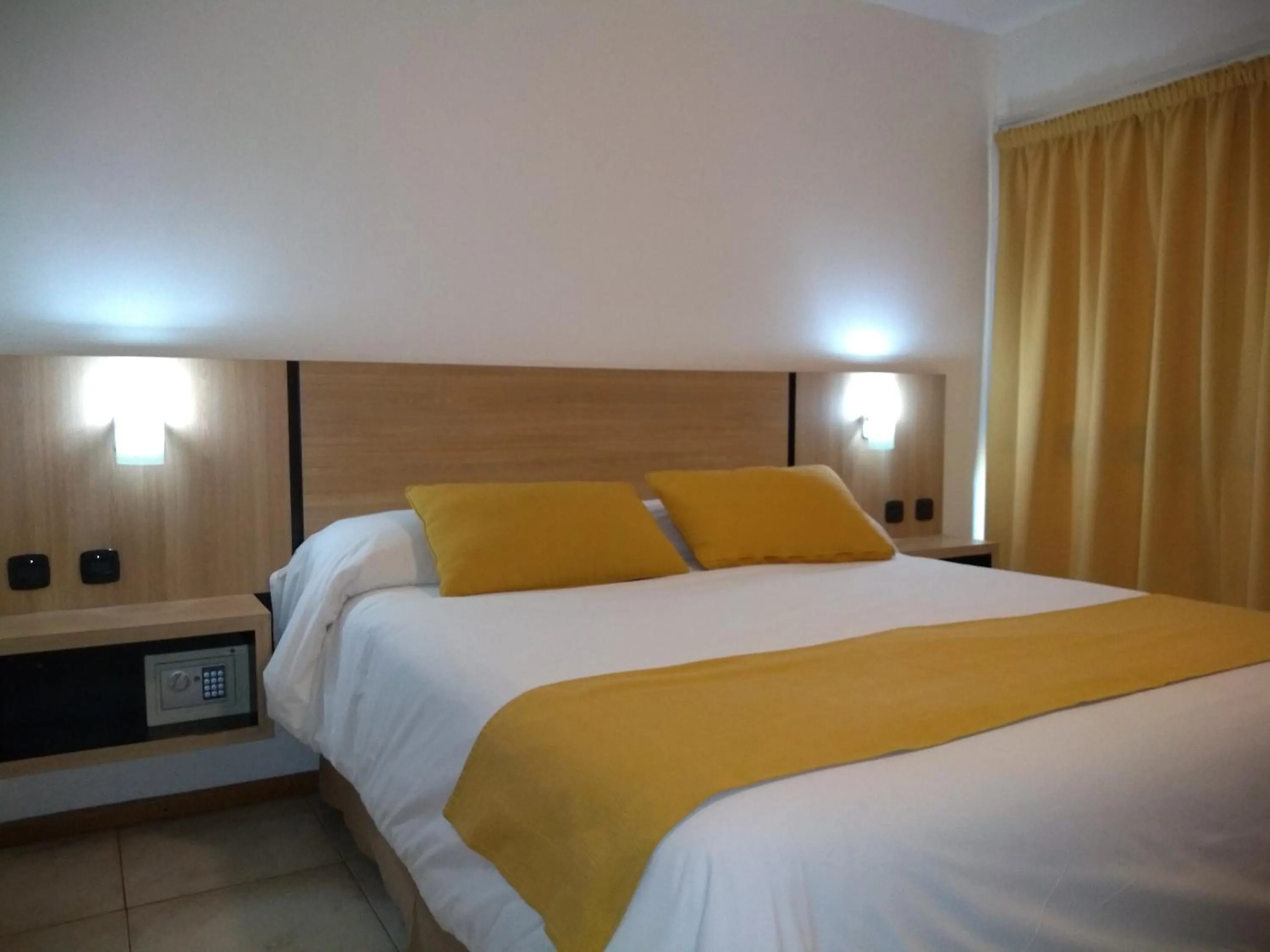 Bed in Apartamentos Mendoza Premium