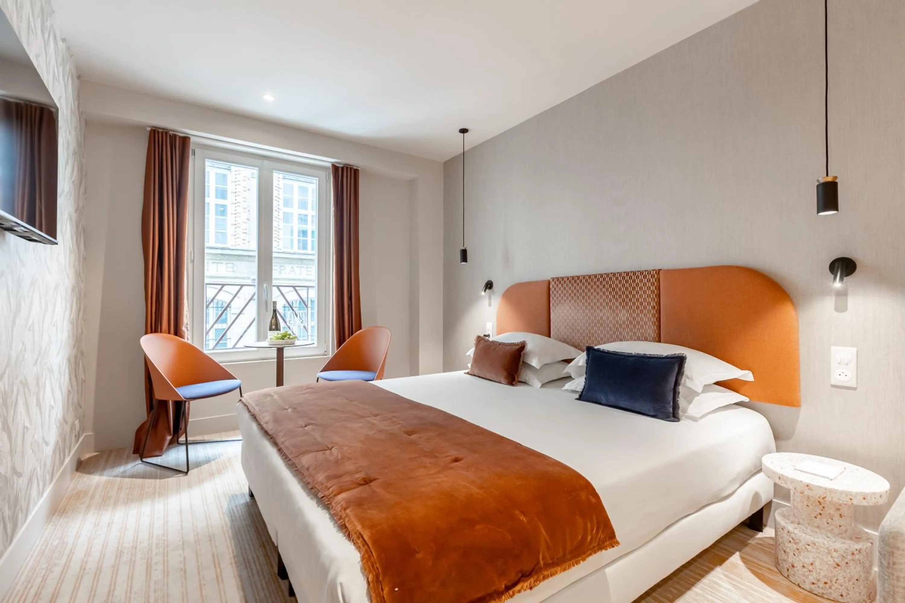 Dining area, Bed in Suites FL By Sweett