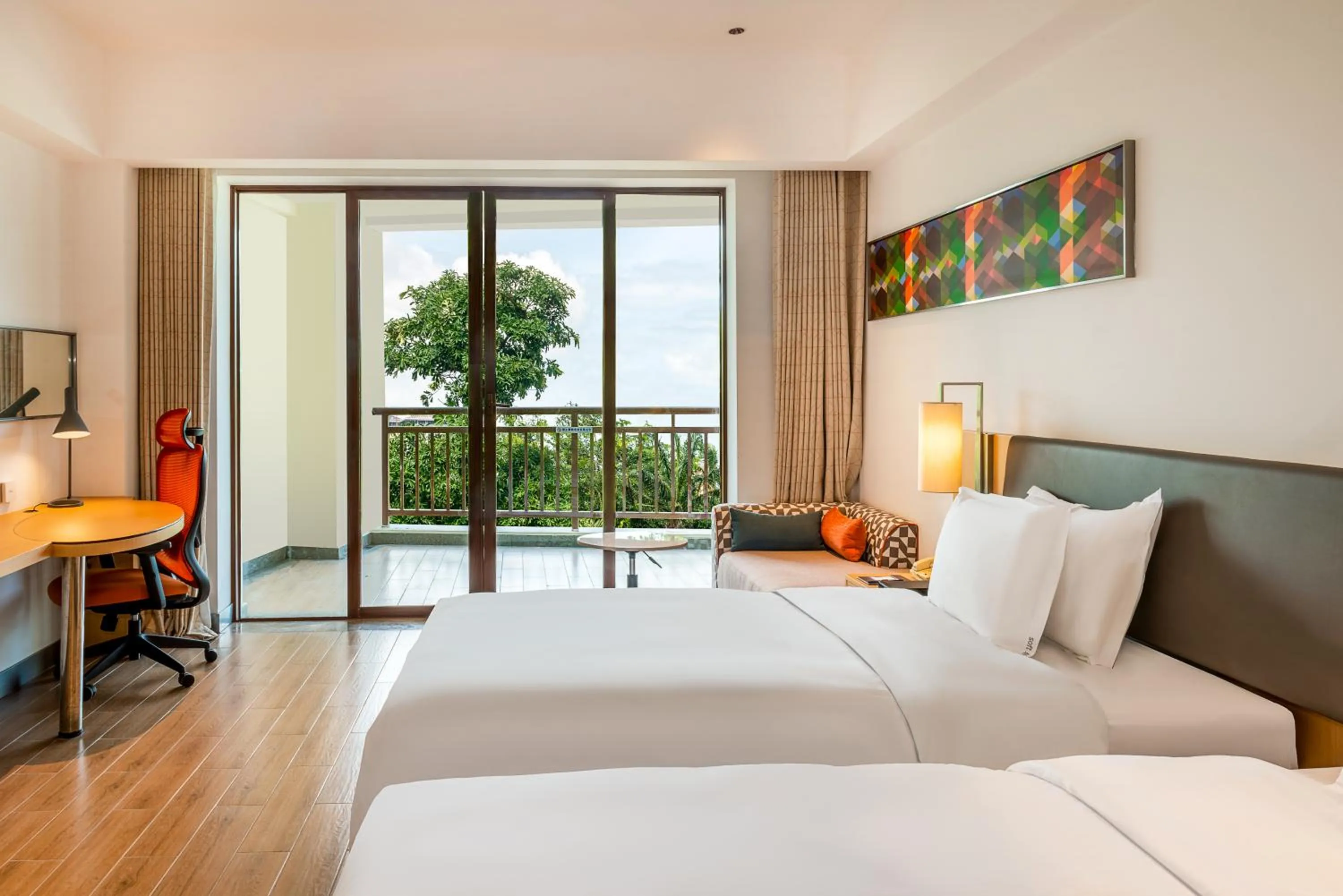 Bed in Holiday Inn Express Haikou West Coast by IHG