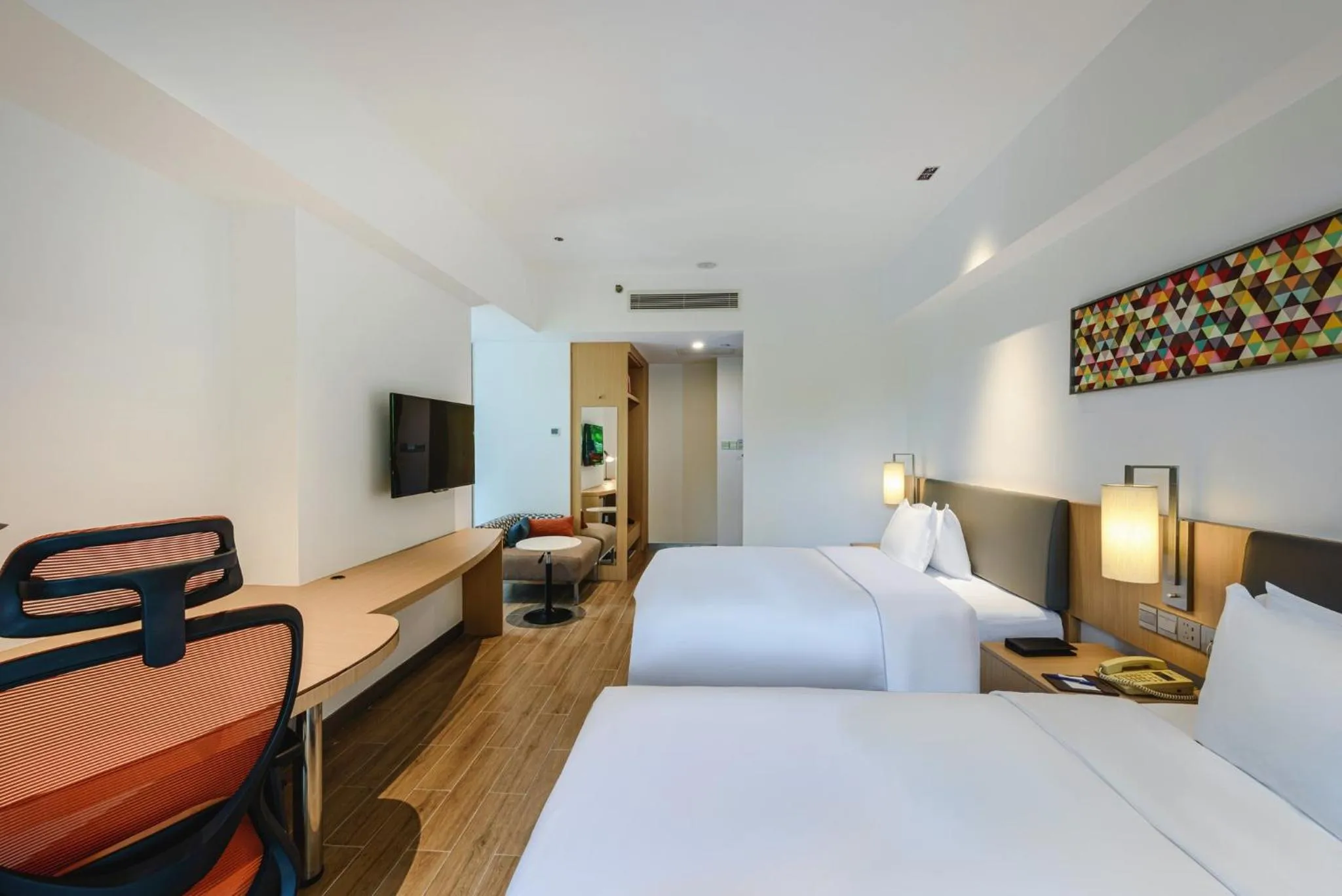 Photo of the whole room, Bed in Holiday Inn Express Haikou West Coast by IHG