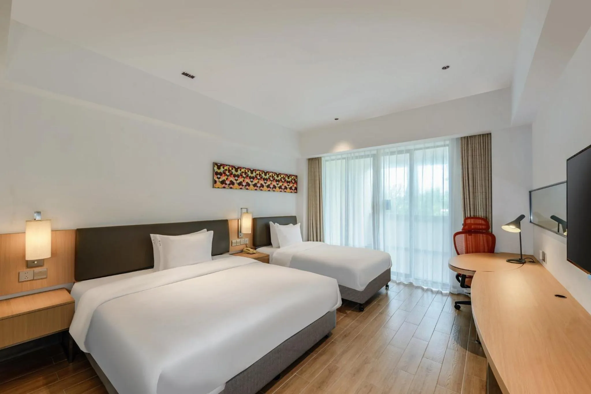 Photo of the whole room, Bed in Holiday Inn Express Haikou West Coast by IHG