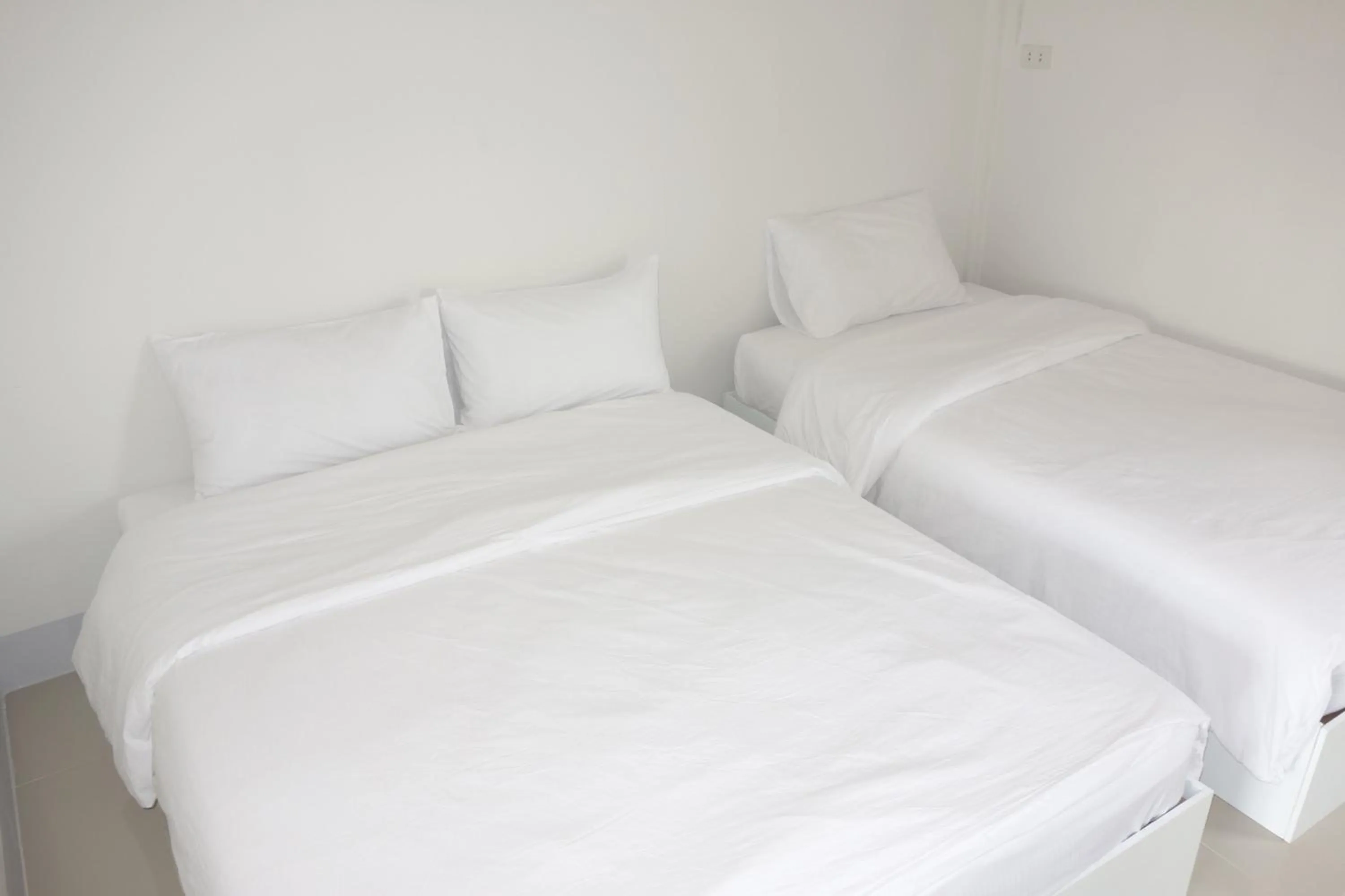 Bed in Honghub Sakon Hotel