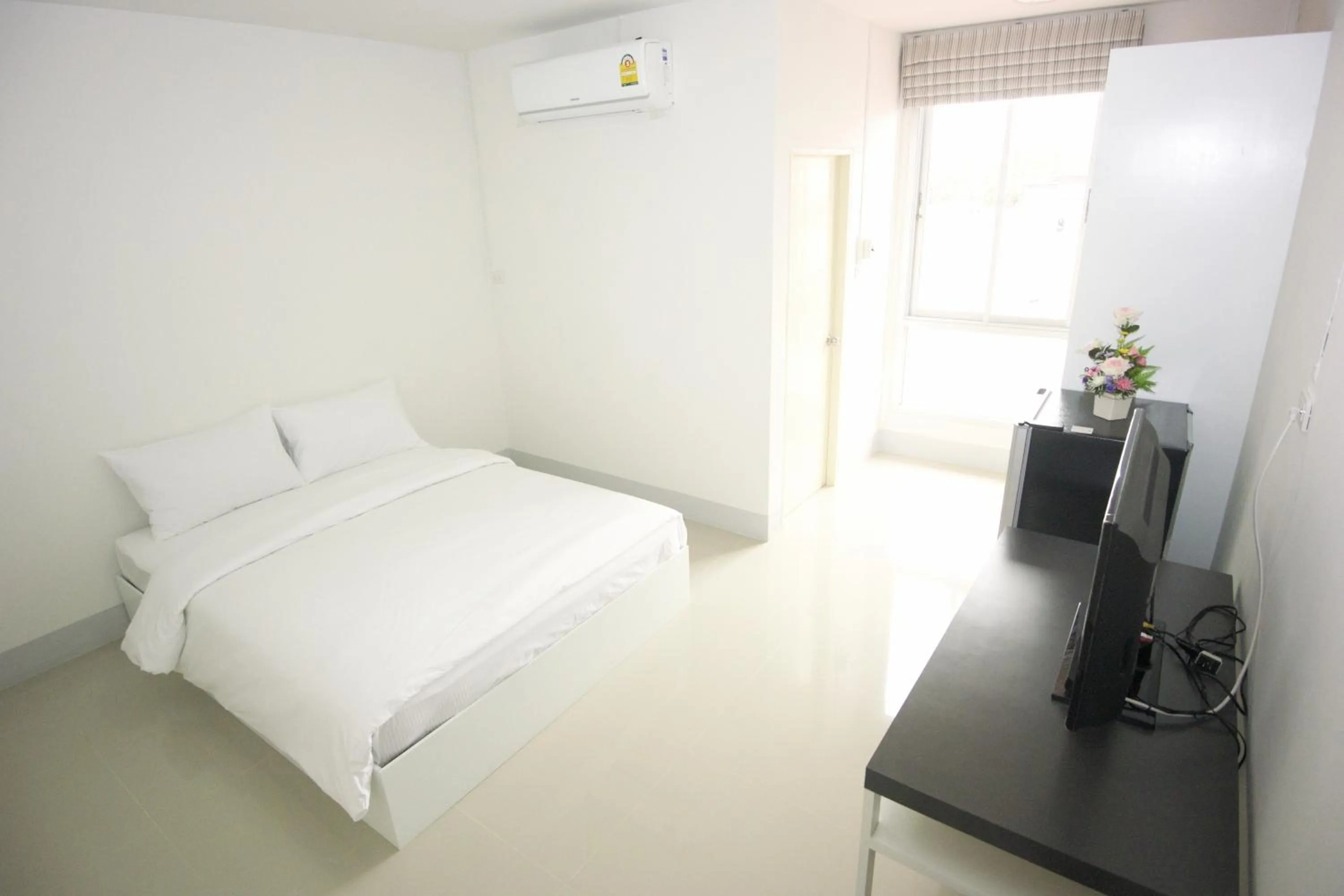 Photo of the whole room, Bed in Honghub Sakon Hotel