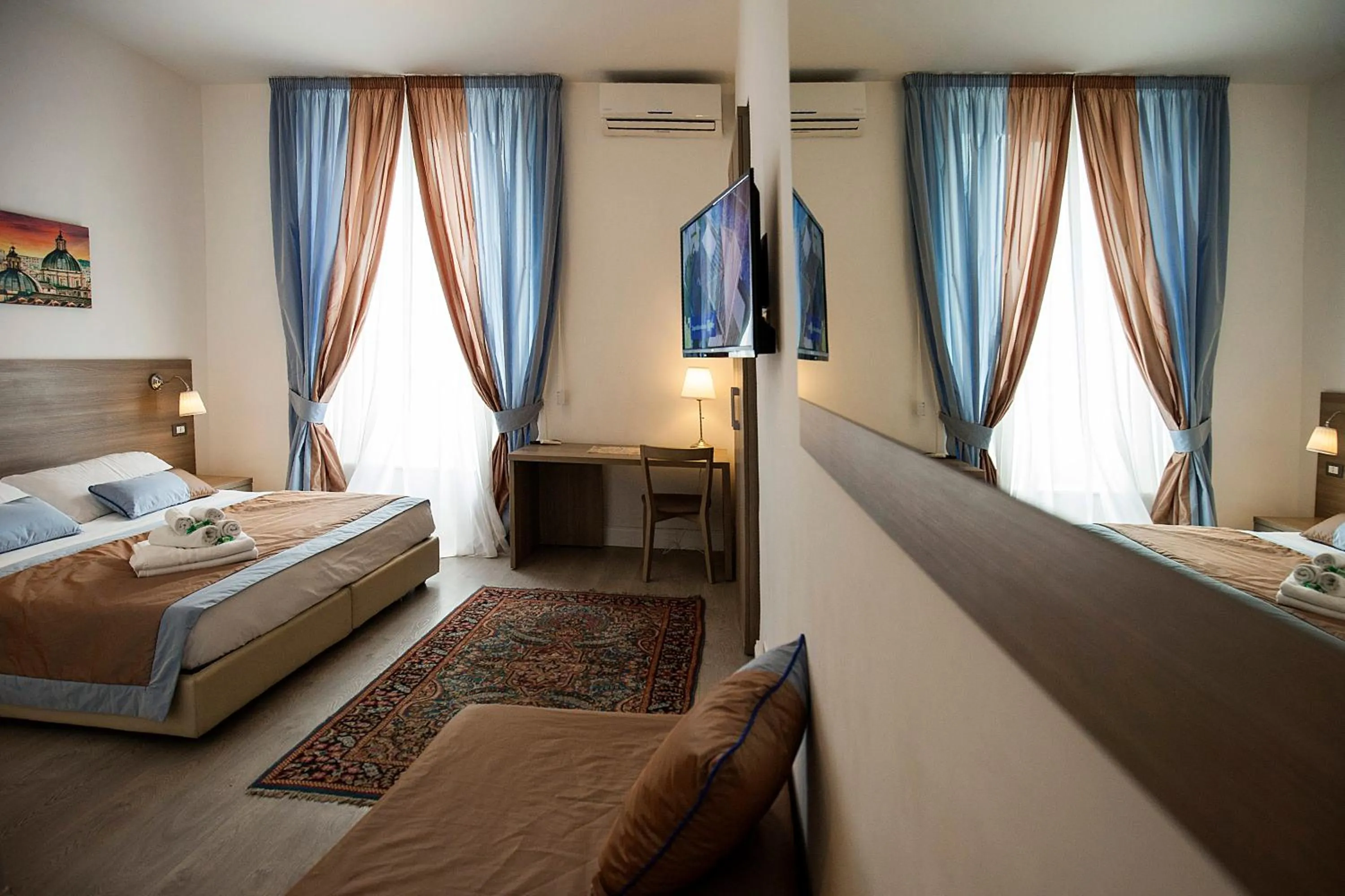 Communal lounge/ TV room, Bed in Roman Holidays cuore dell'Impero