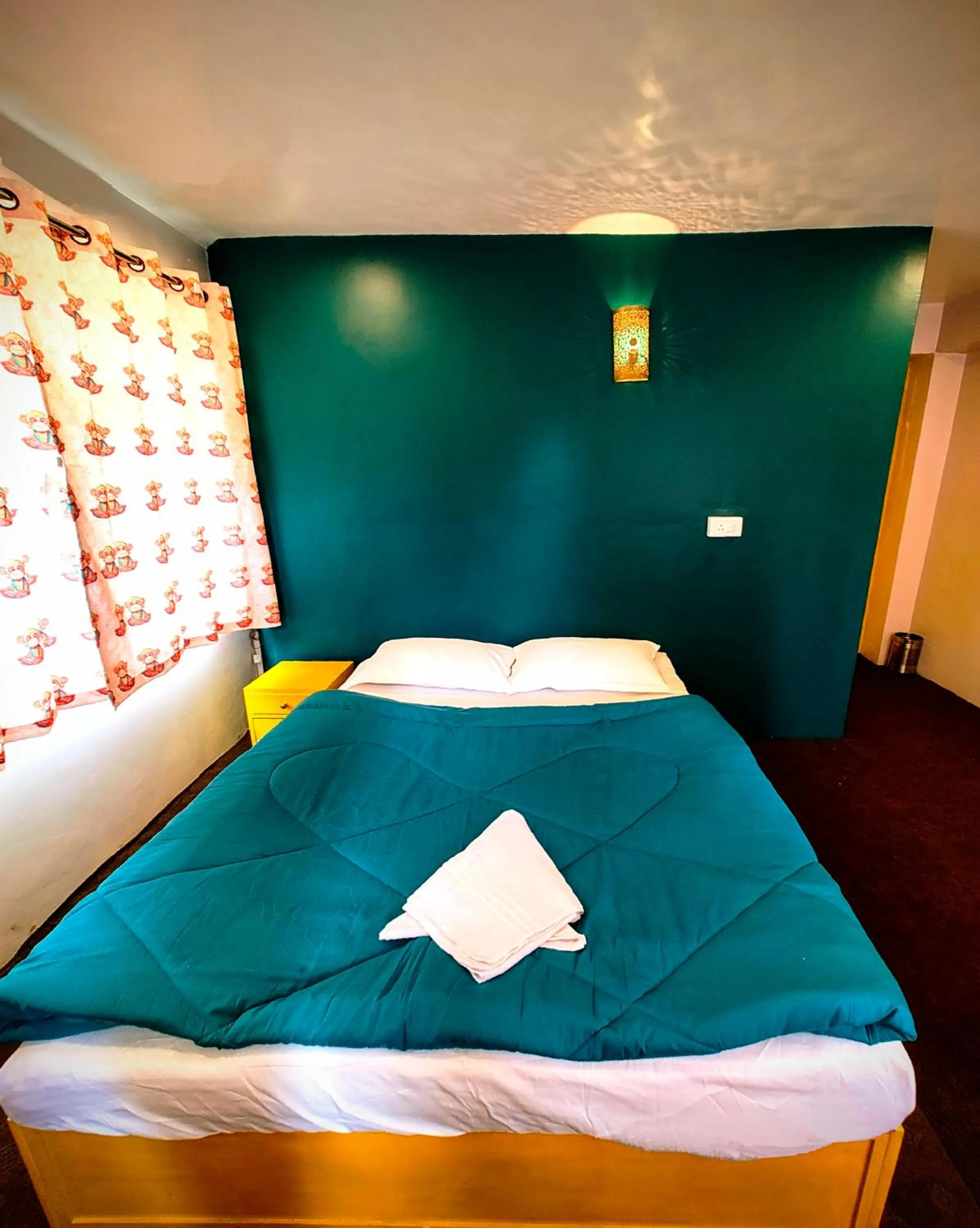 Bed in Hidden Monkey Stays Darjeeling, Batasia