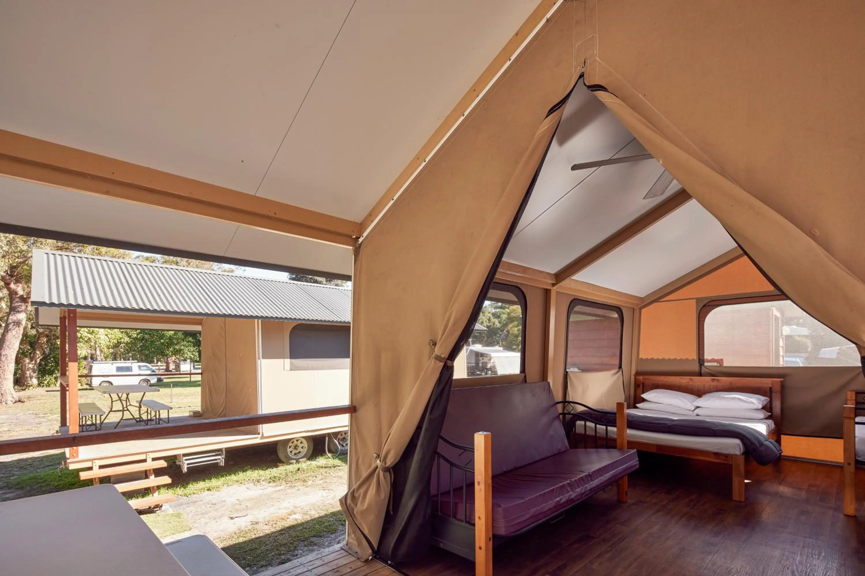 Seating area, Bed in NRMA South West Rocks Holiday Park