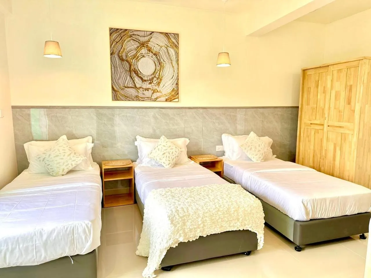 Bed in YUVi Blue Maldives & spa