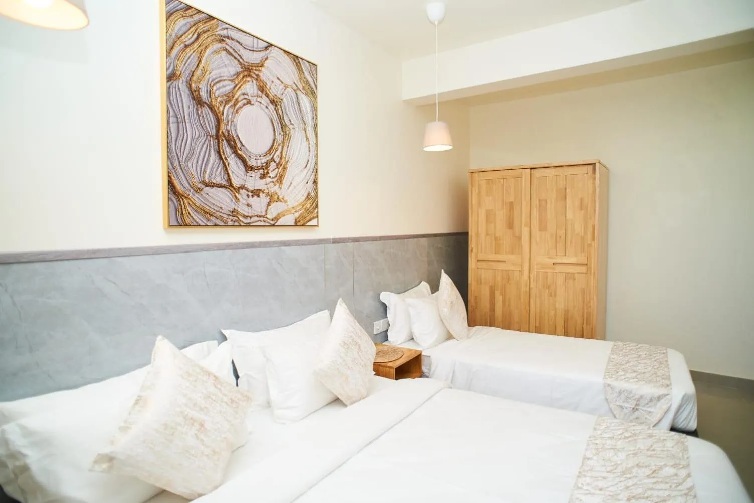 Bed in YUVi Blue Maldives & spa