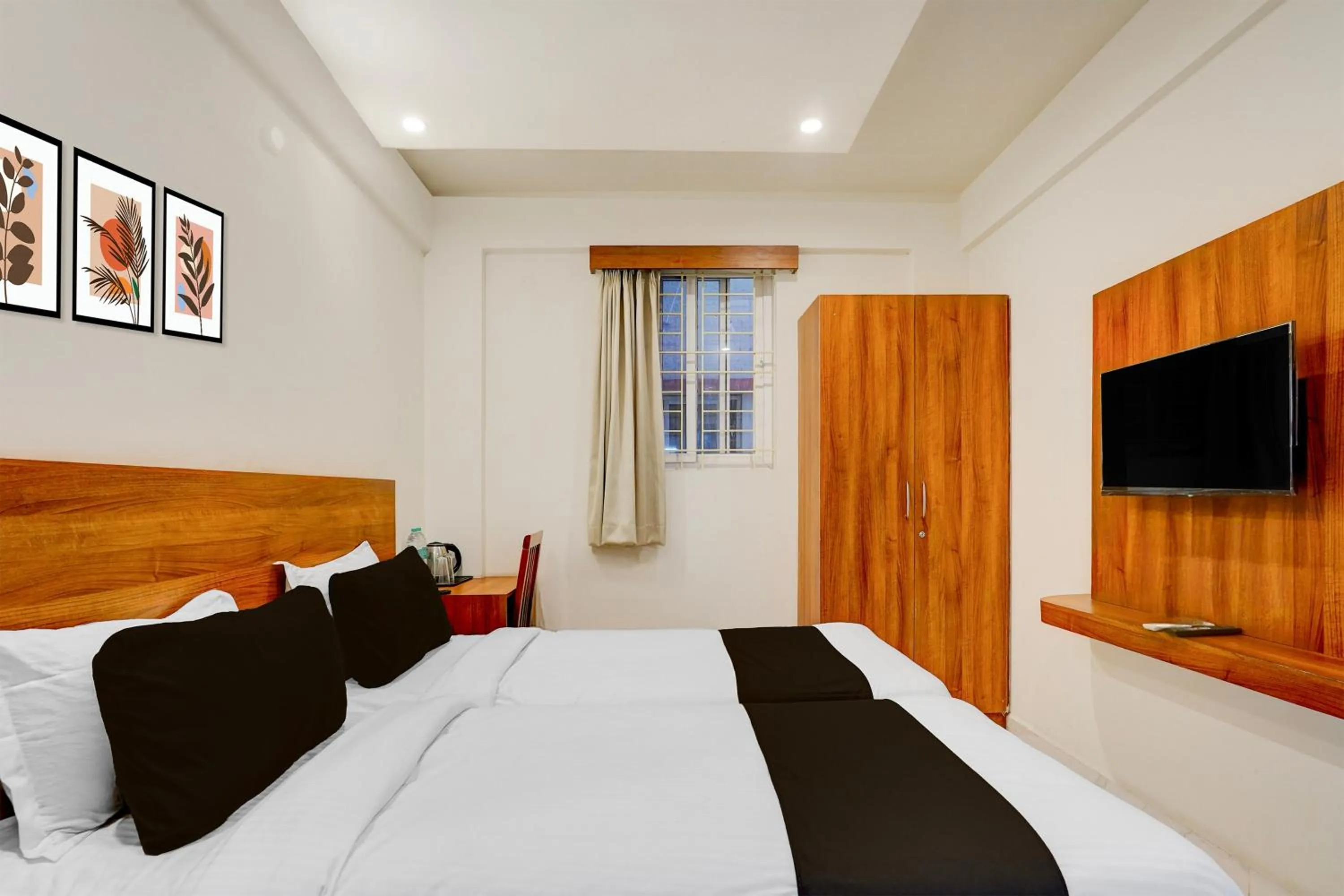 Bedroom, Bed in Super Townhouse Marathahalli Near Sri Nagalingeshwar Swamy Temple Formerly Hotel Avenue