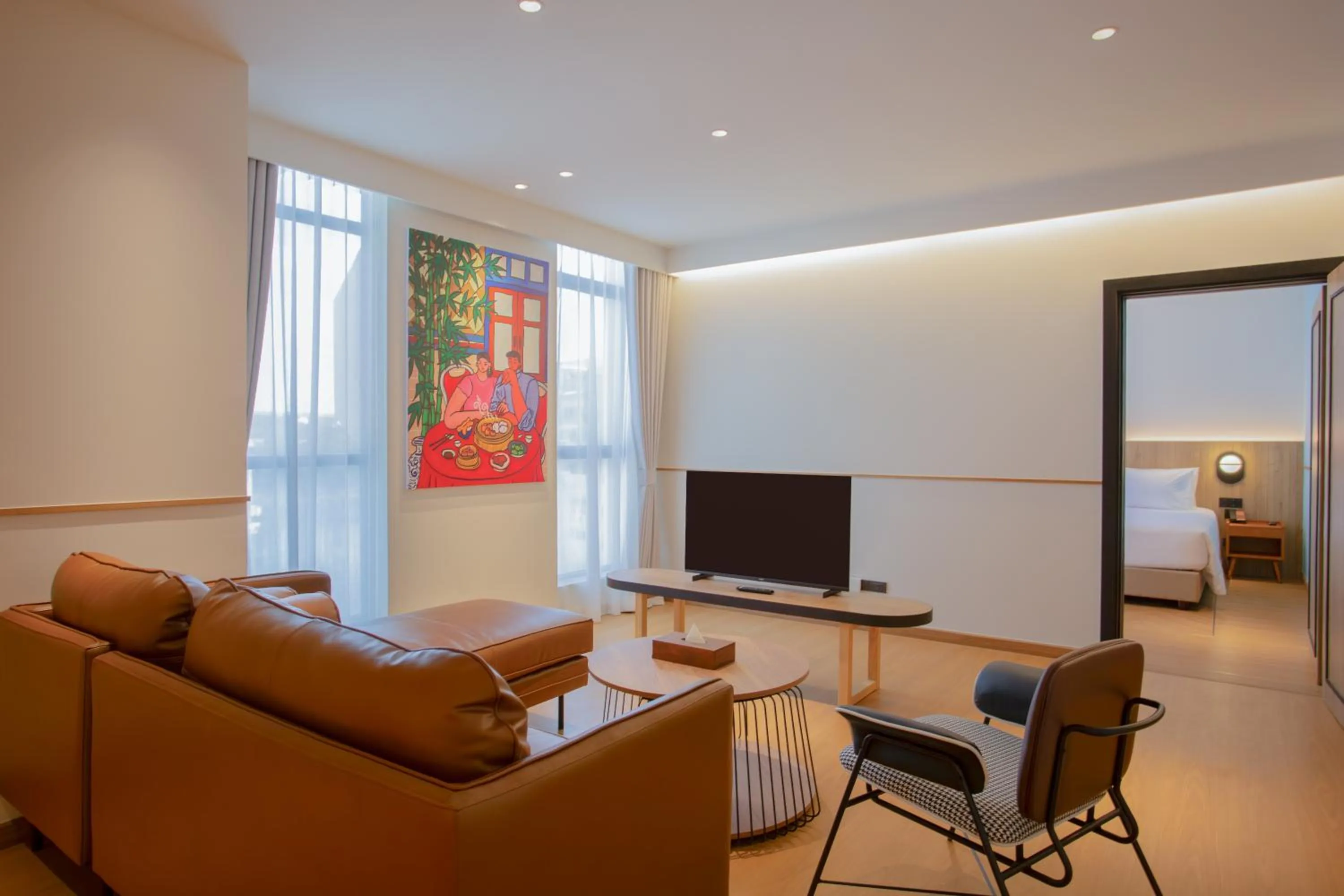 Communal lounge/ TV room in Lub d Bangkok Chinatown - Steps from Sam Yod MRT Station