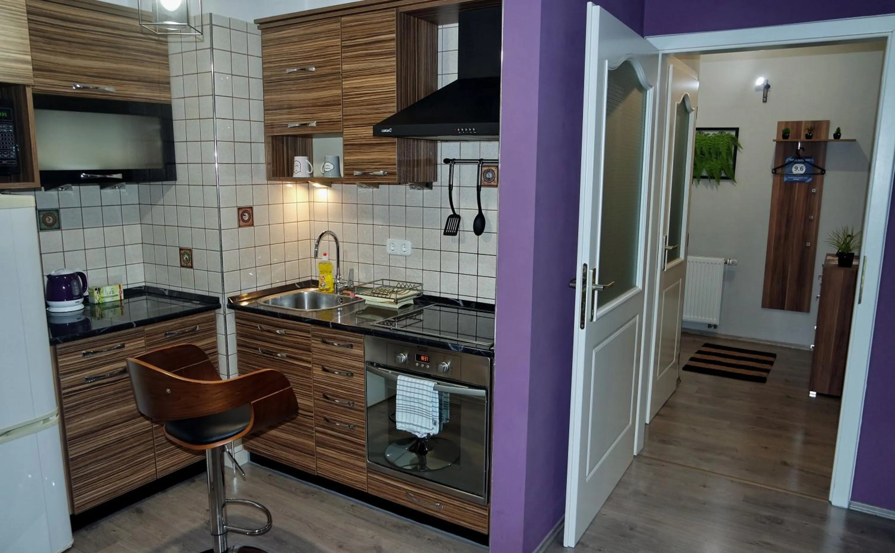 Kitchen or kitchenette in Nidius Apartment