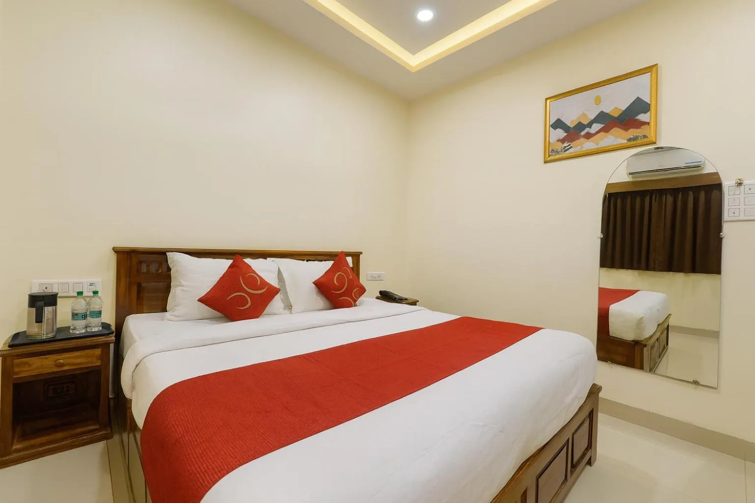 Photo of the whole room, Bed in Hotel Jyotirlinga- One Way Drop to Mahakal Temple