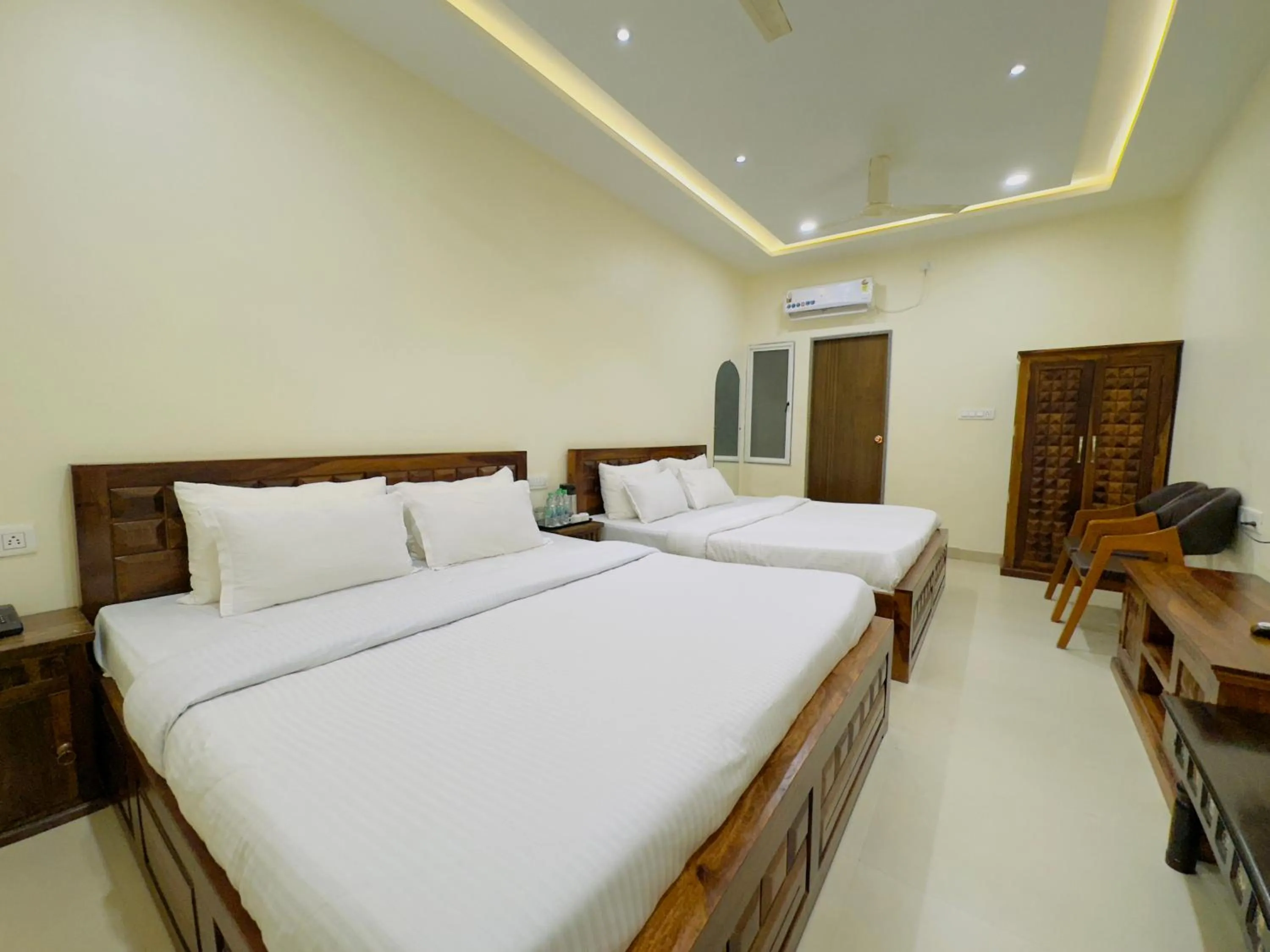 Bed in Hotel Jyotirlinga- One Way Drop to Mahakal Temple