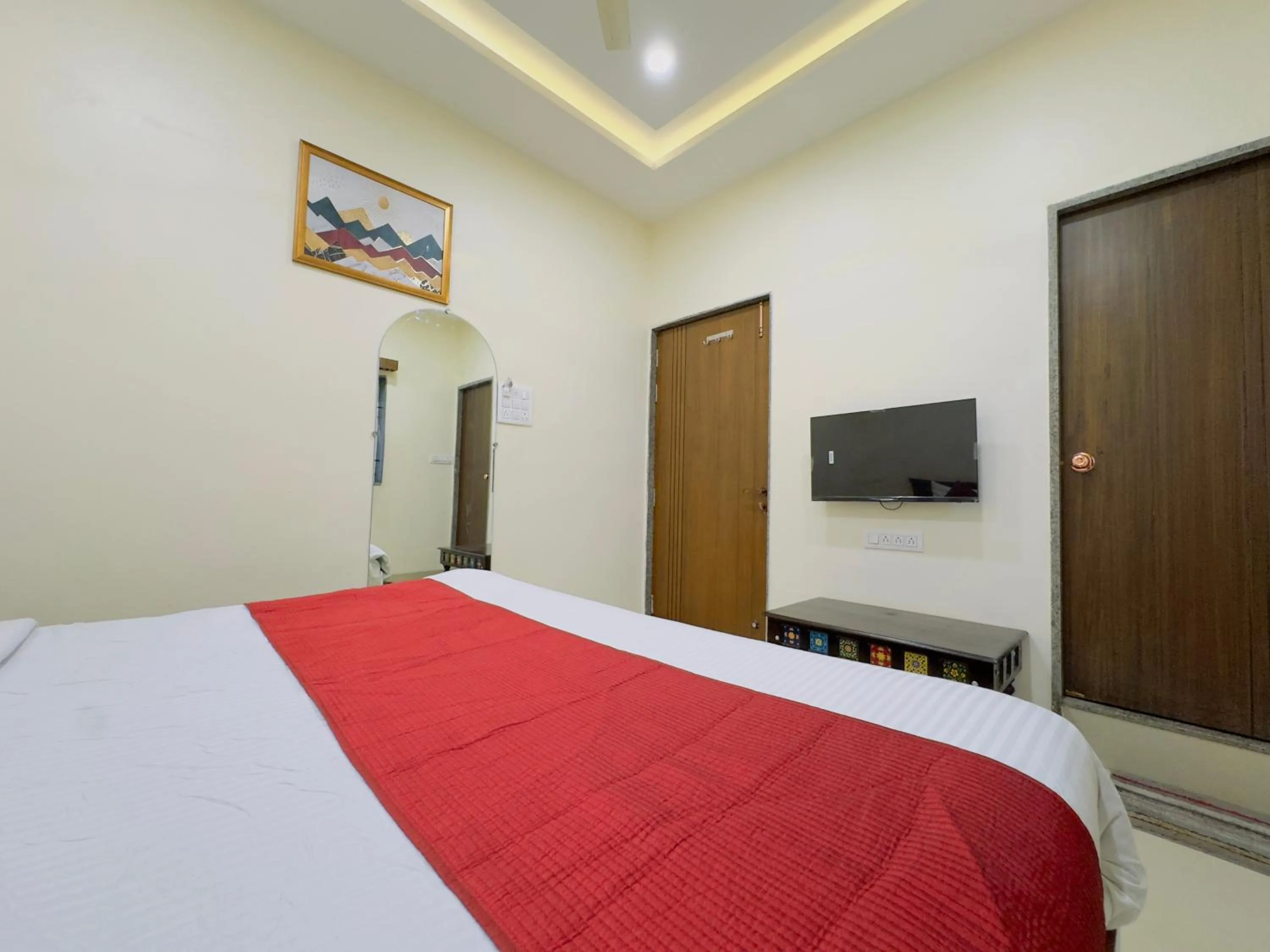 Bedroom, Bed in Hotel Jyotirlinga- One Way Drop to Mahakal Temple