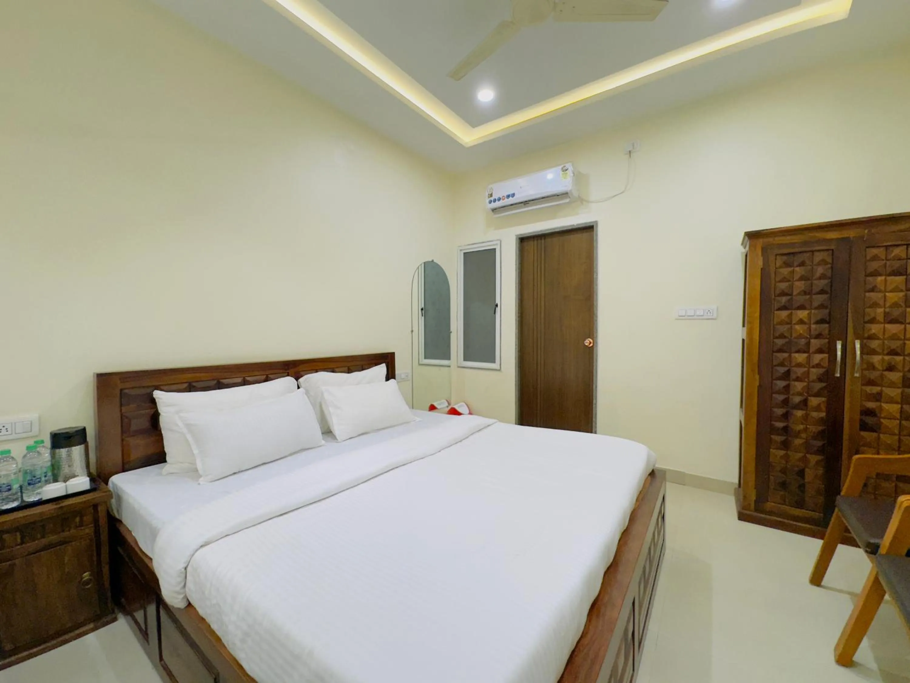 Bed in Hotel Jyotirlinga- One Way Drop to Mahakal Temple