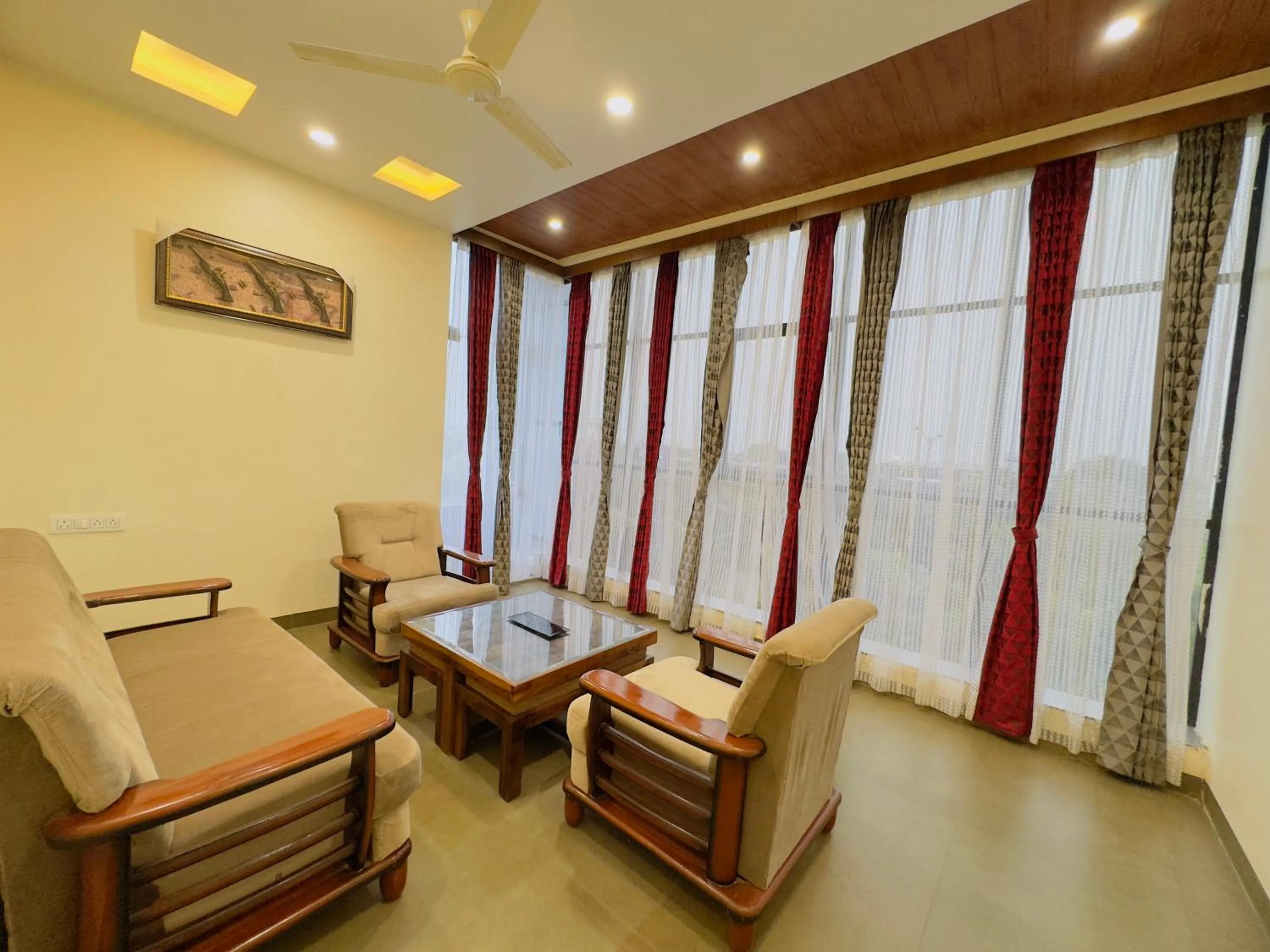 Seating area in Hotel Jyotirlinga- One Way Drop to Mahakal Temple