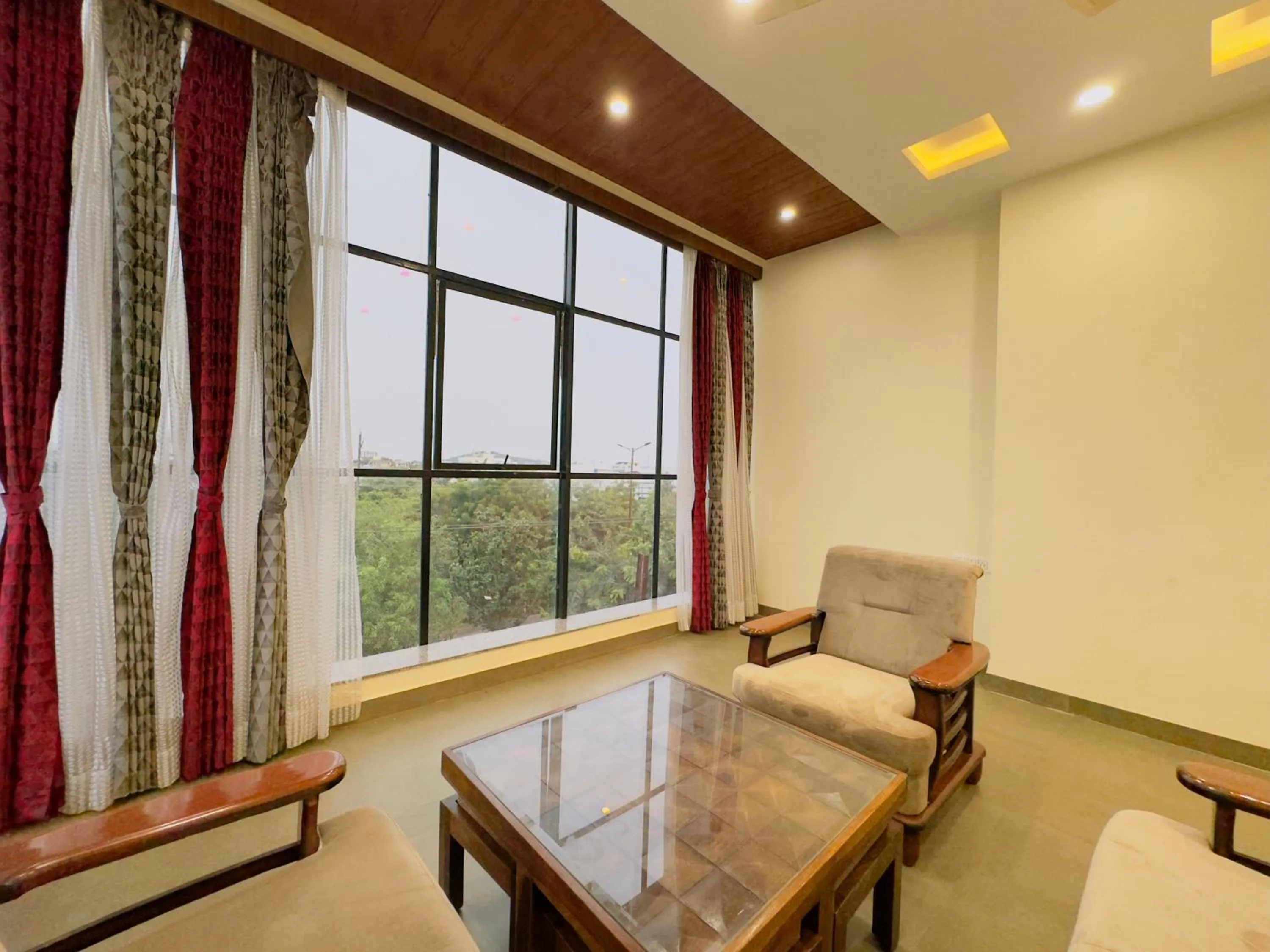 Living room in Hotel Jyotirlinga- One Way Drop to Mahakal Temple