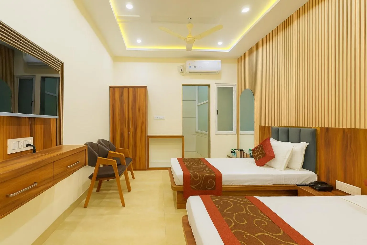 air conditioner, Bed in Hotel Jyotirlinga- One Way Drop to Mahakal Temple