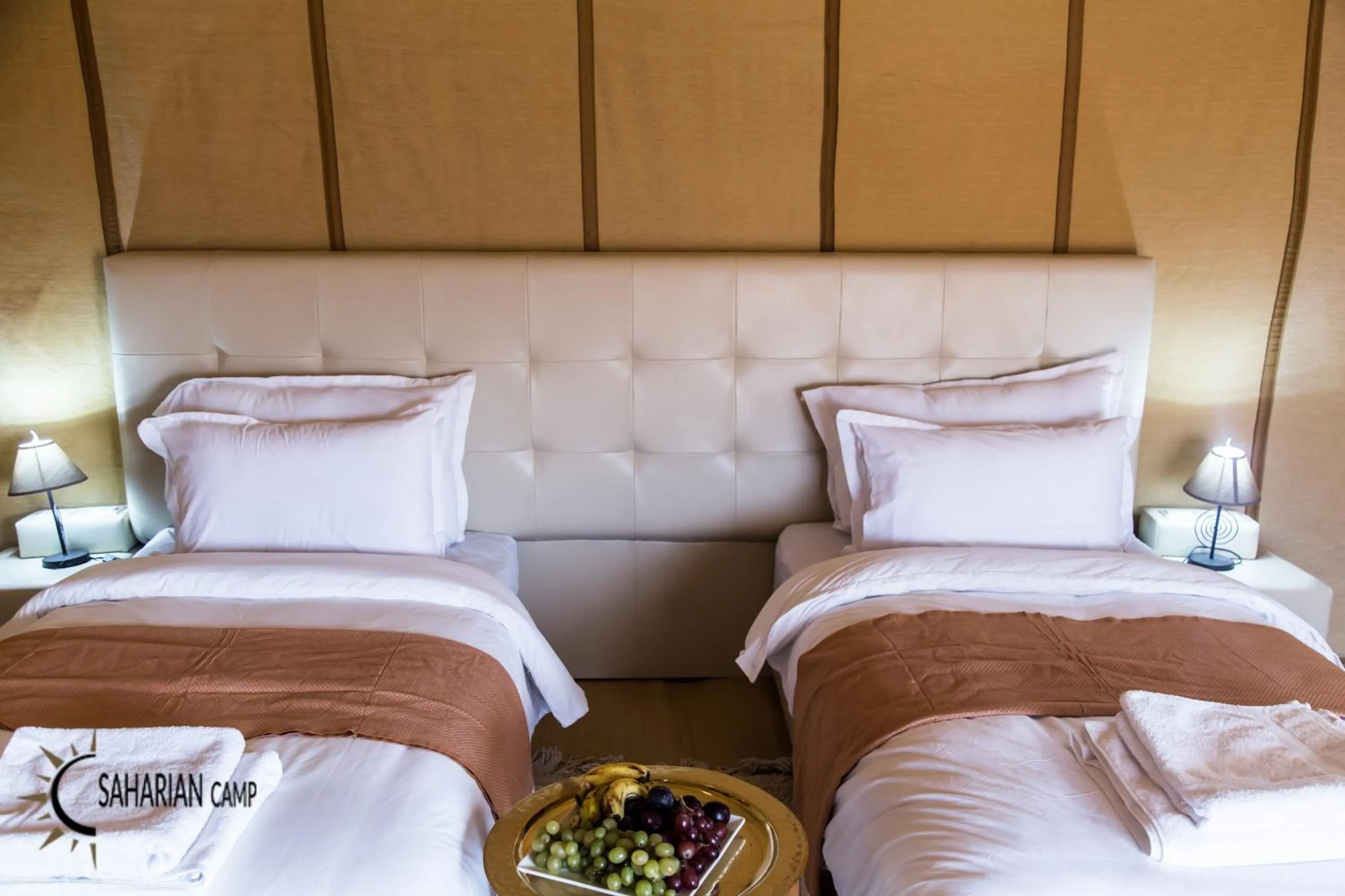 Bed in Merzouga Luxury Camp