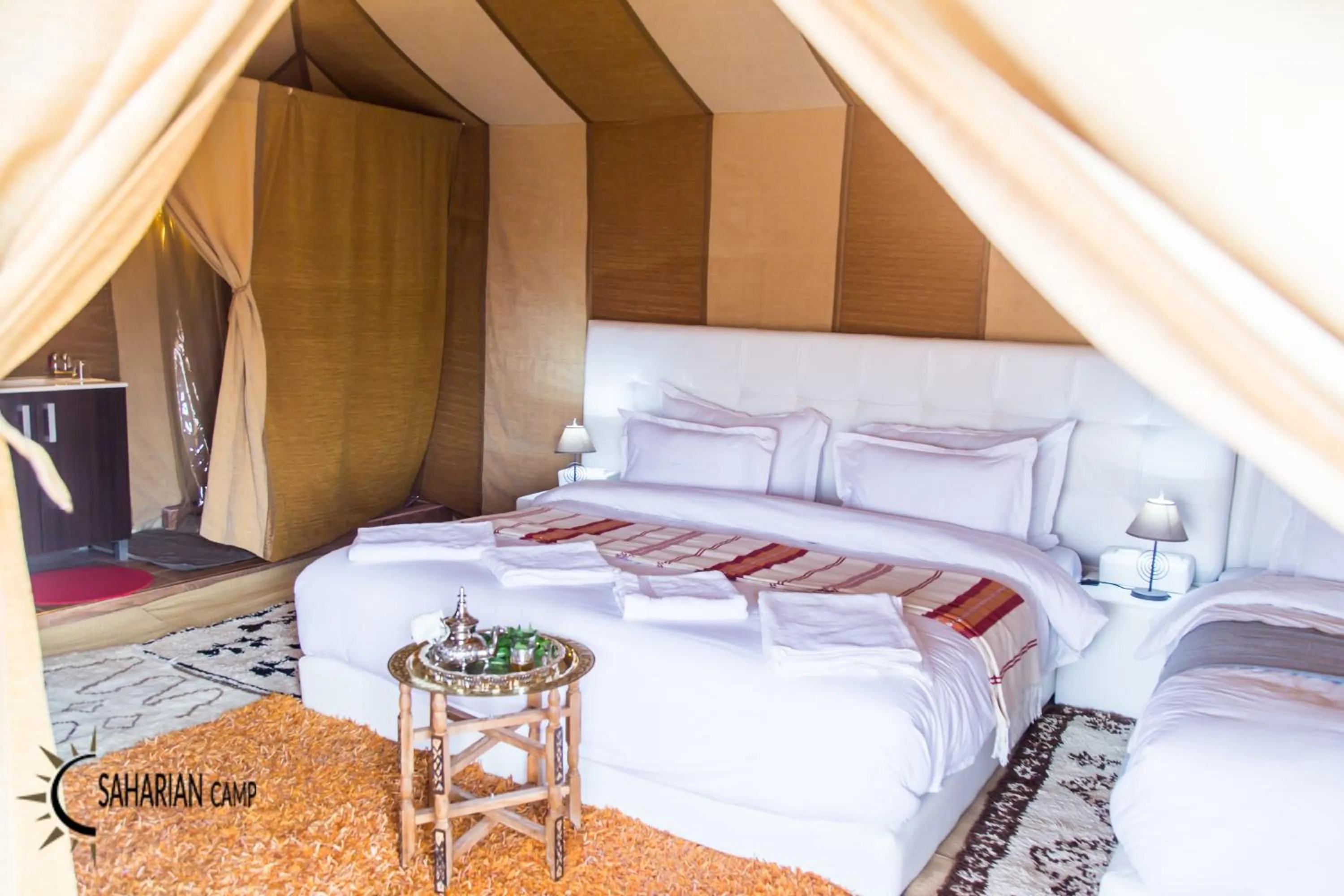 Bed in Merzouga Luxury Camp