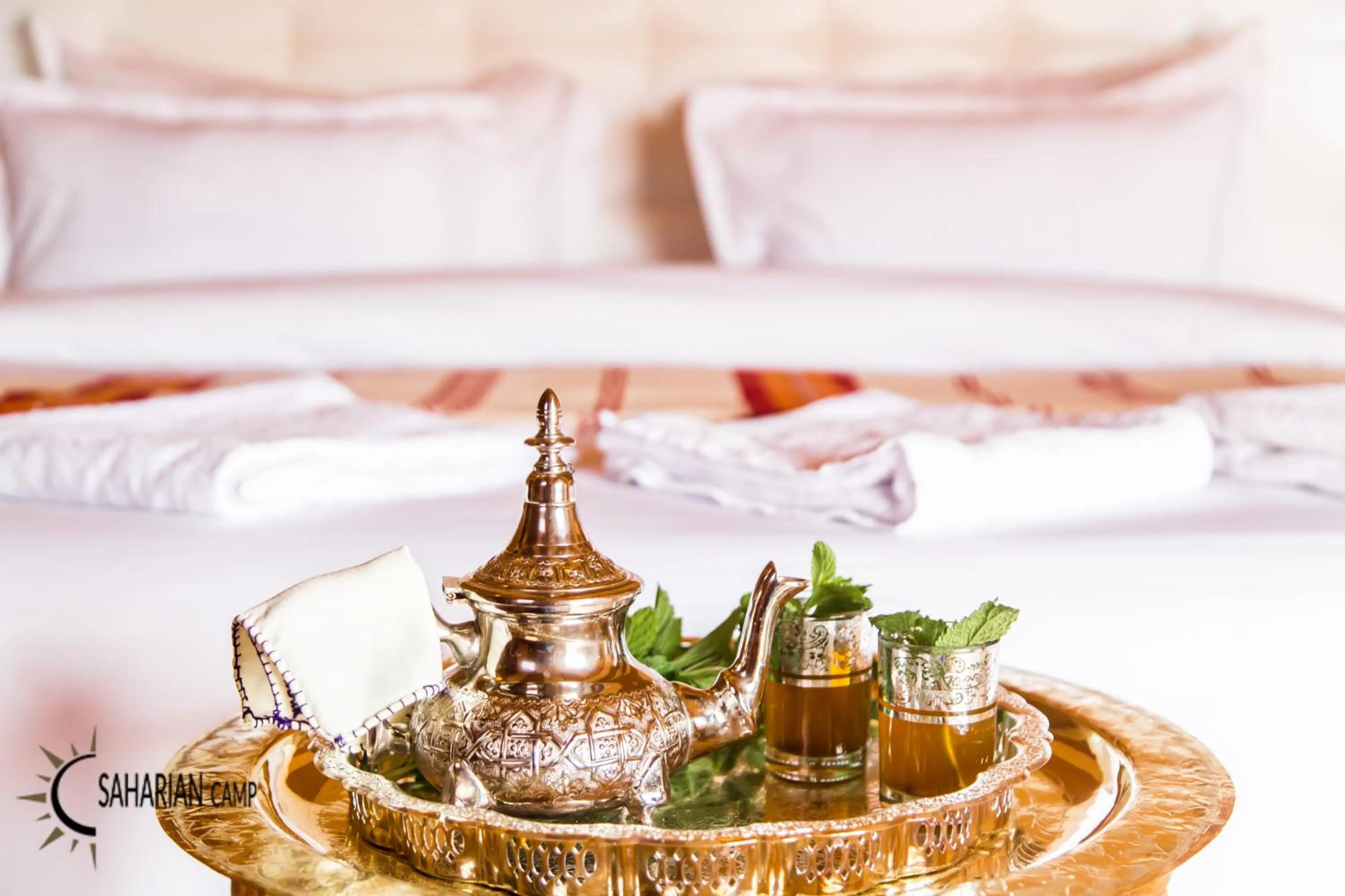 Bed in Merzouga Luxury Camp