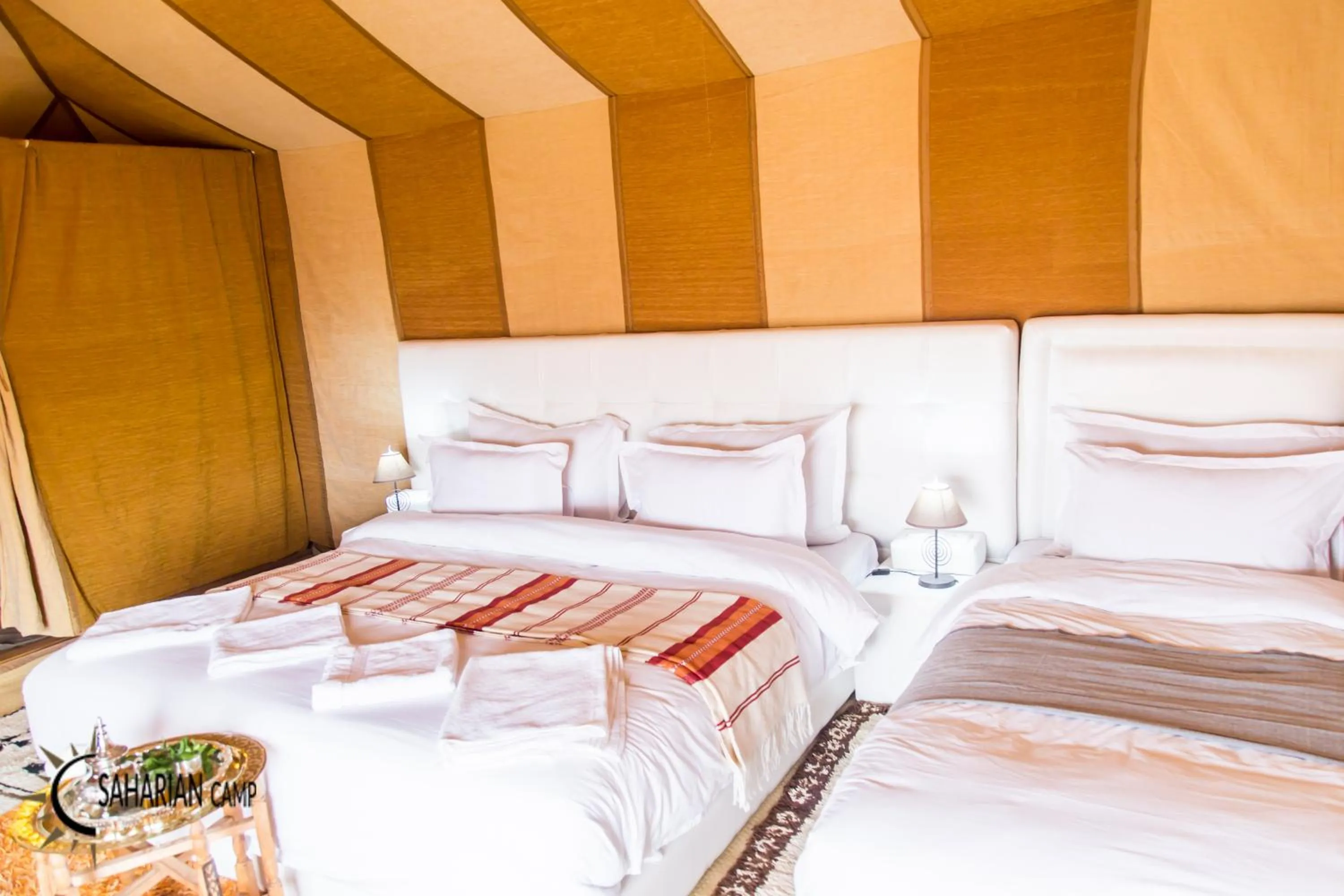 Photo of the whole room, Bed in Merzouga Luxury Camp