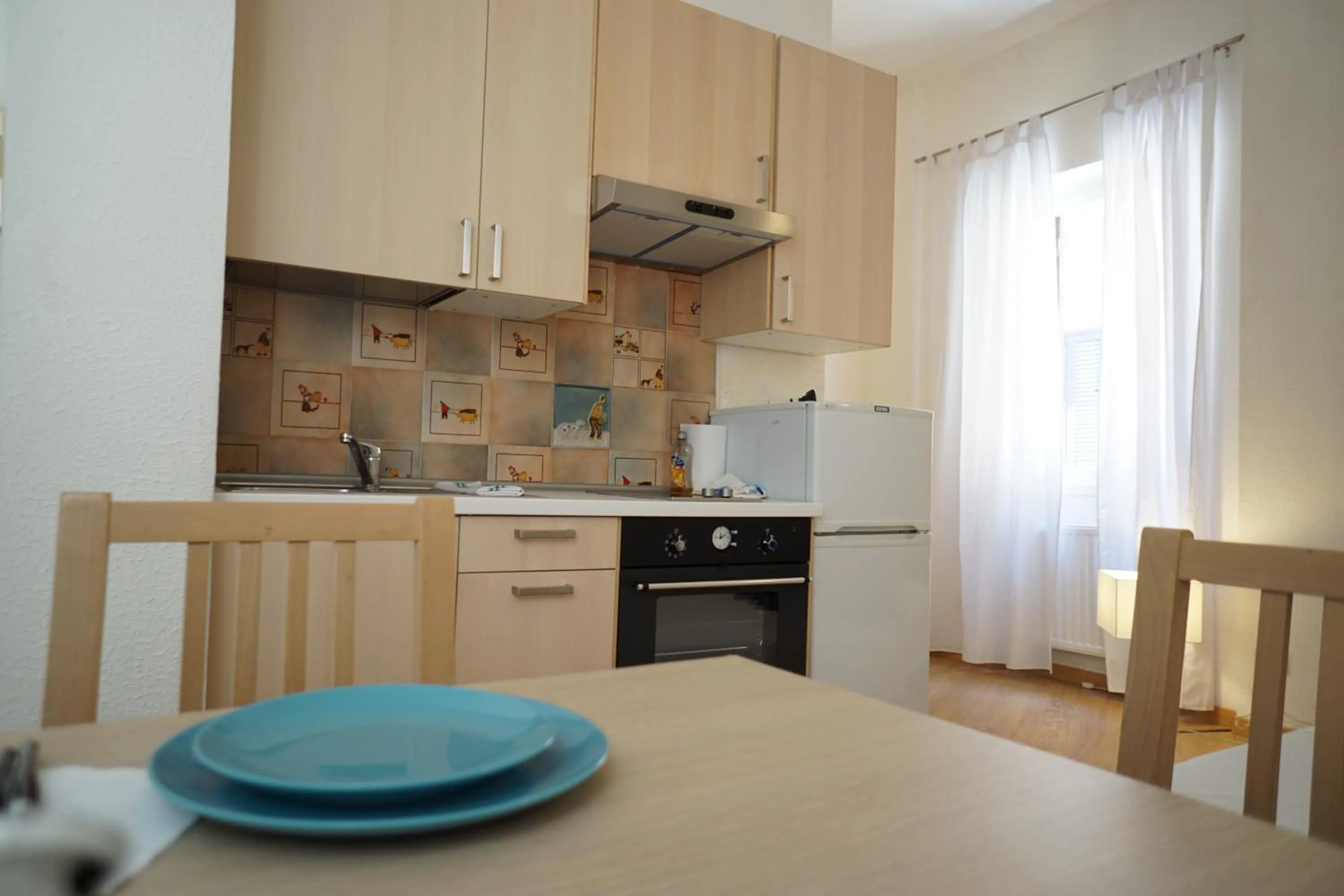 Communal lounge/ TV room in B&S Suite Colosseo