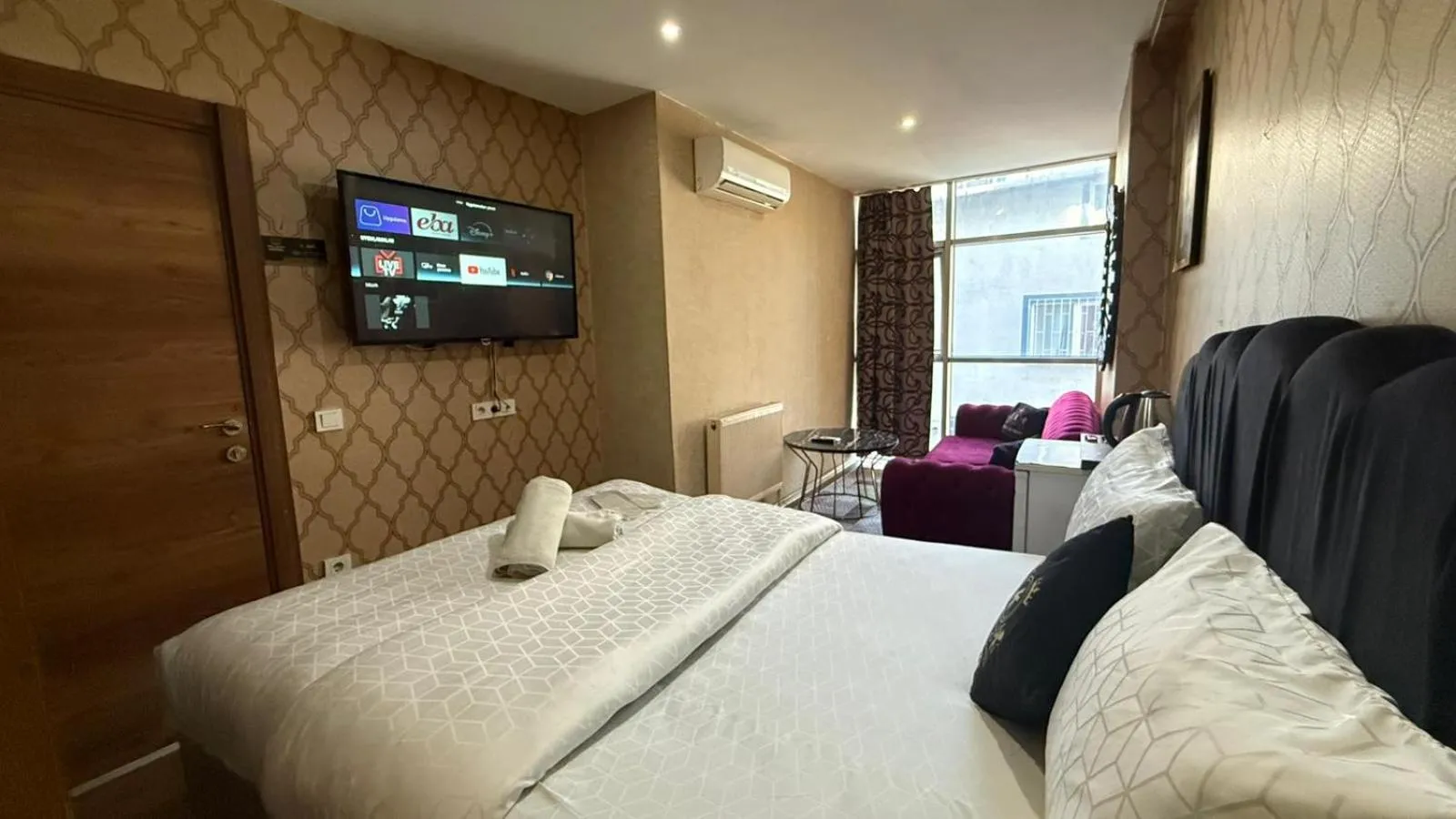 Bed in Kral As Suite Hotel