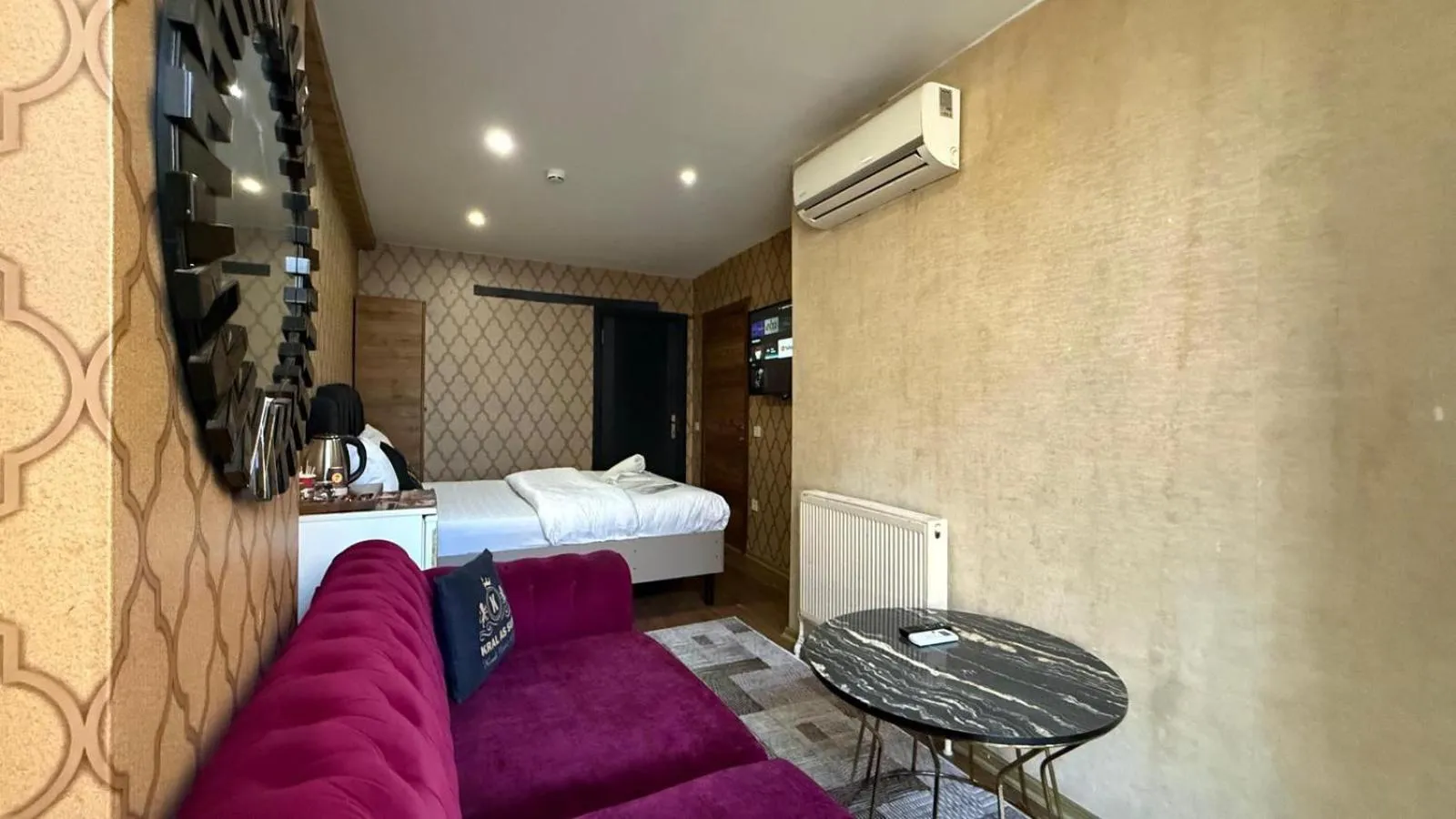 Bed in Kral As Suite Hotel