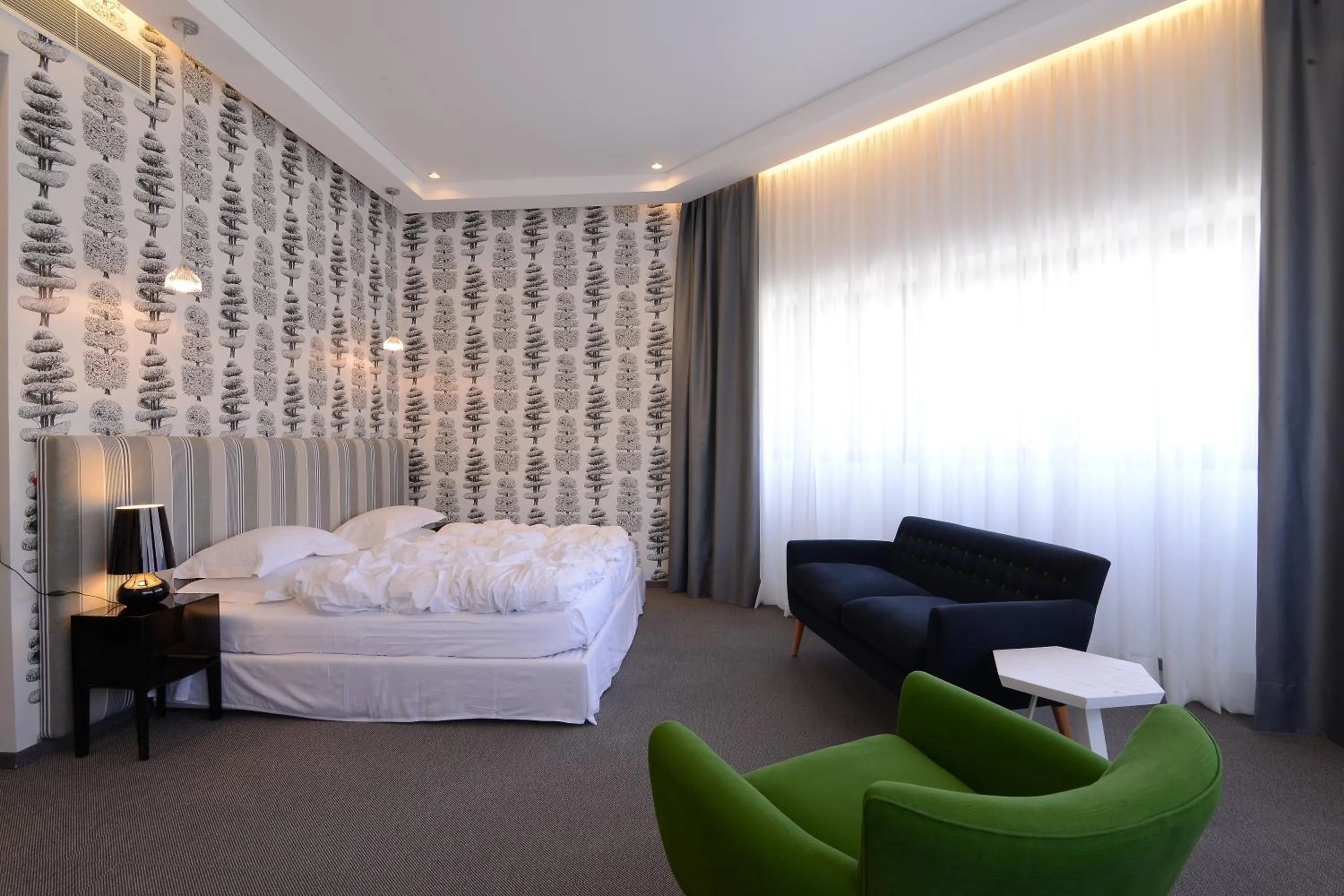 Bed in Miramar Hotel Resort and Spa