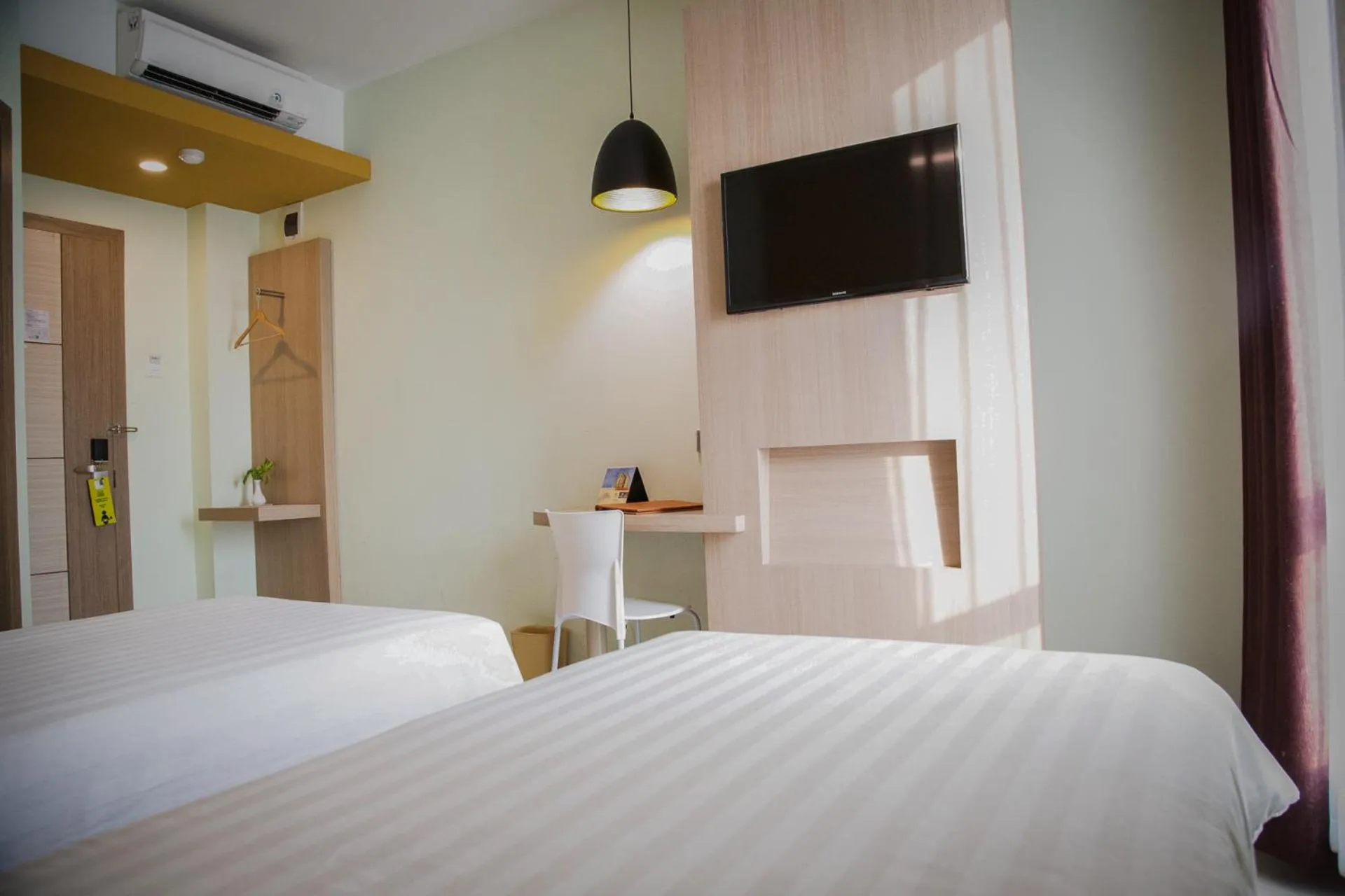 Bed in Infinity Hotel Jambi By Tritama Hospitality