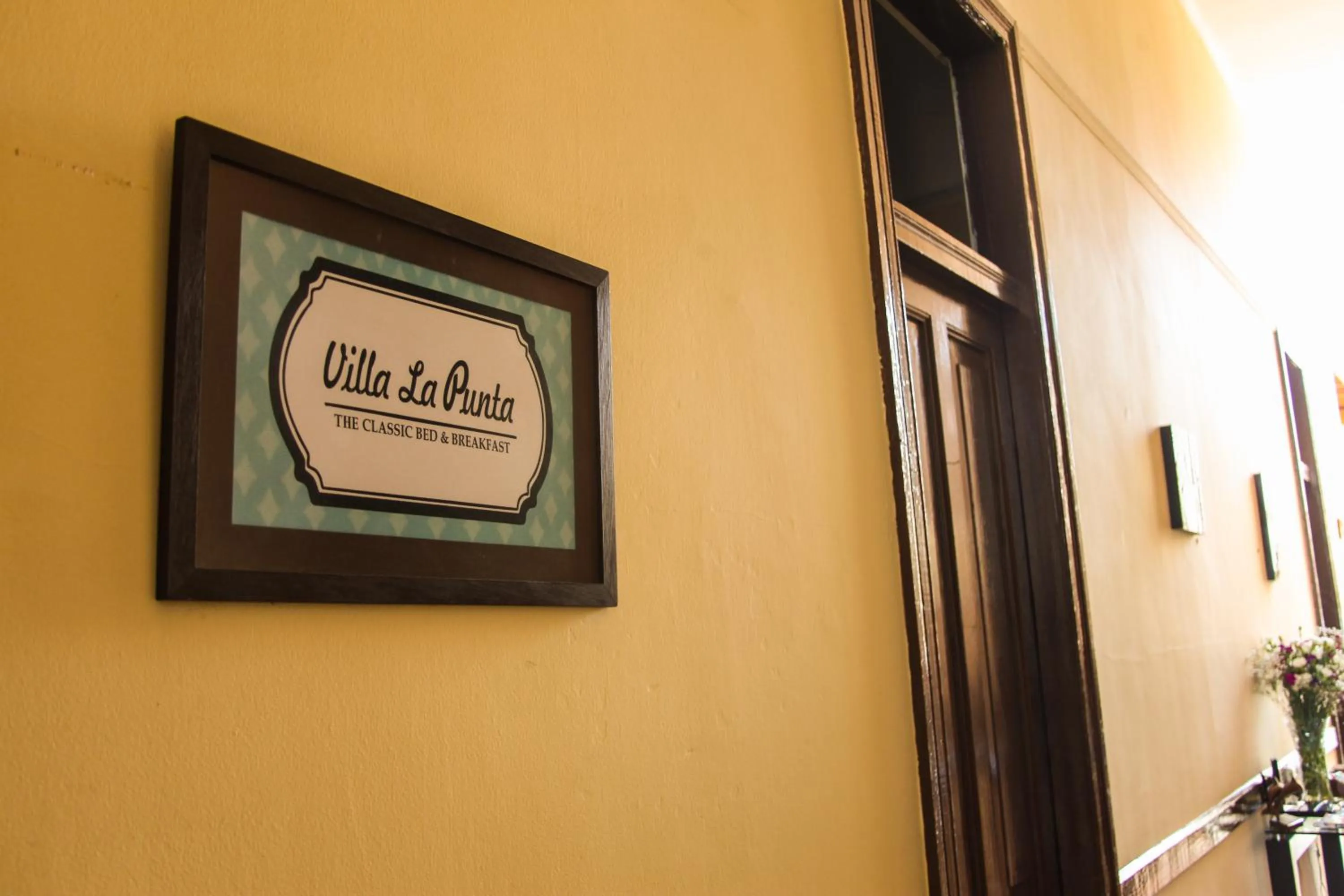 Property logo or sign in Villa La Punta