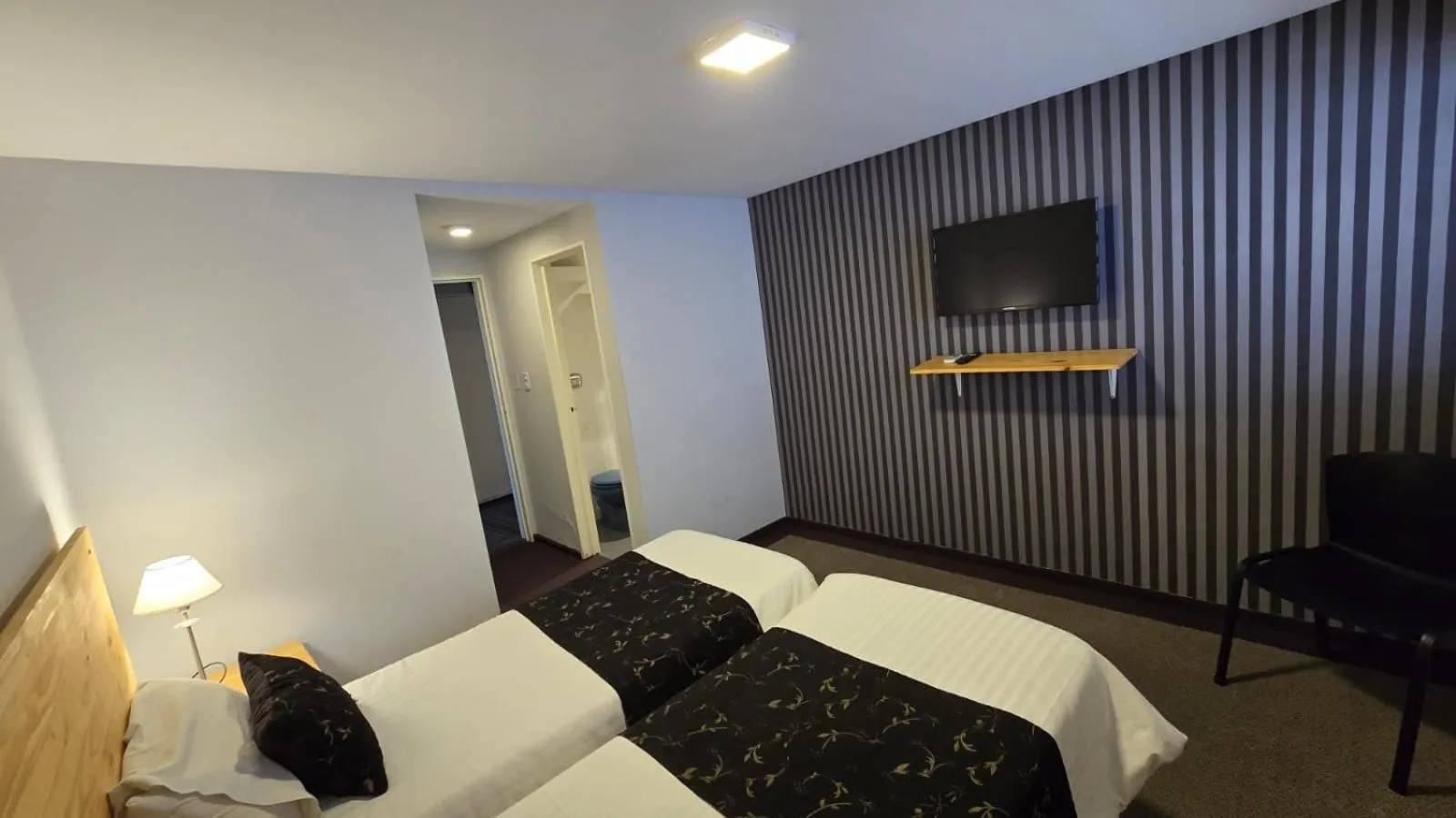 Bed in Santiago Hotel