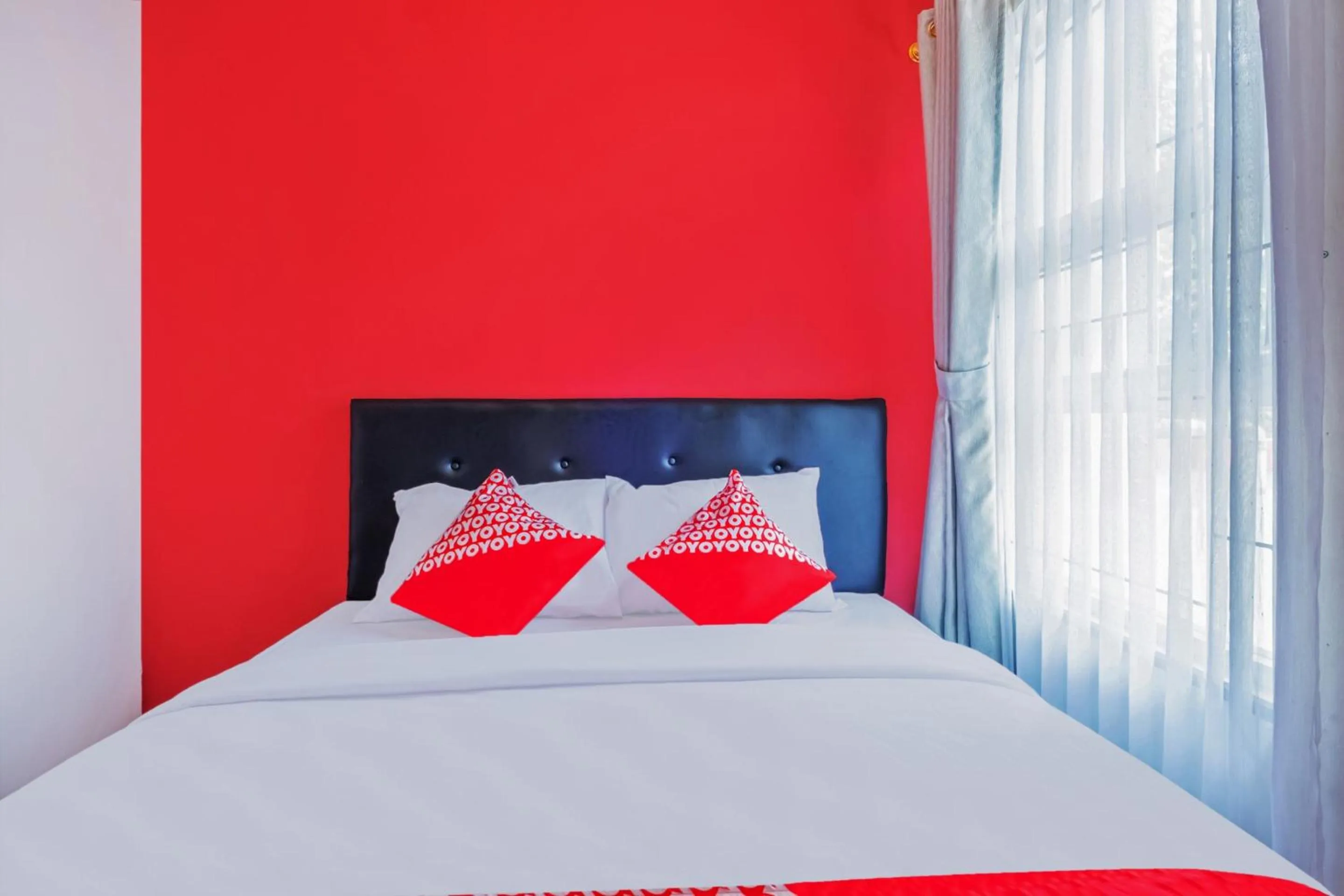 Bedroom in Hotel O Sudirman Guesthouse Syariah