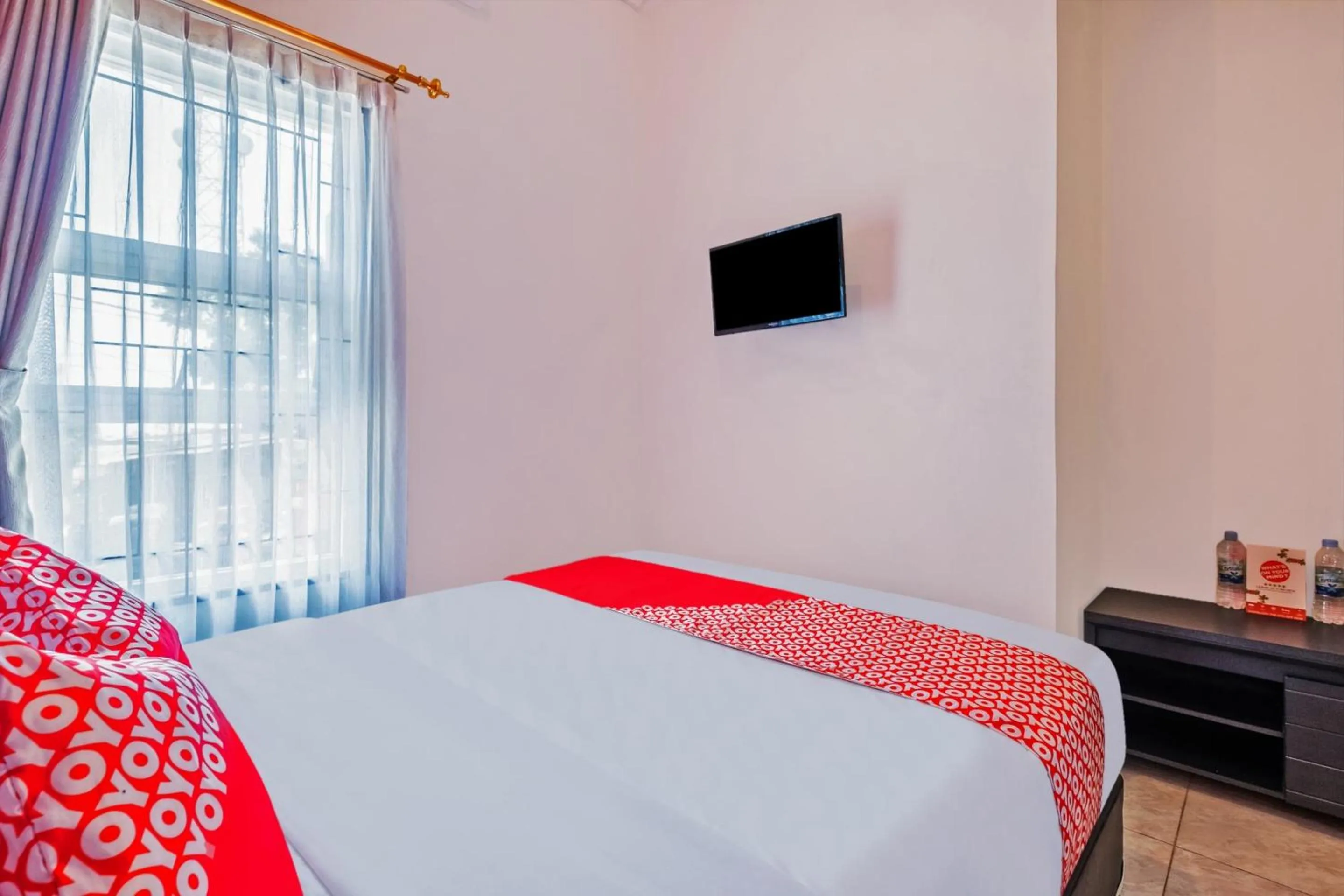 Bedroom in Hotel O Sudirman Guesthouse Syariah