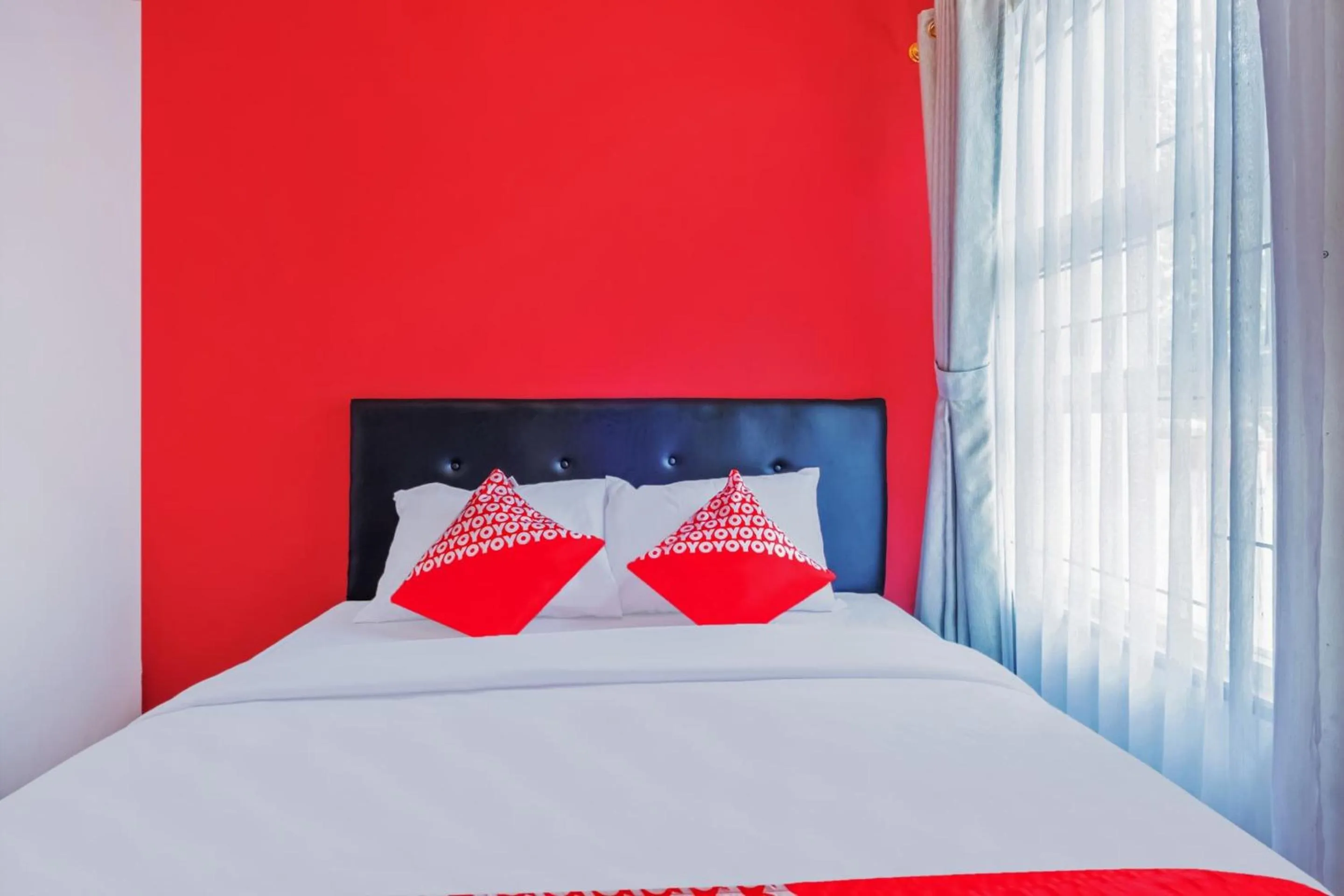 Bedroom in Hotel O Sudirman Guesthouse Syariah