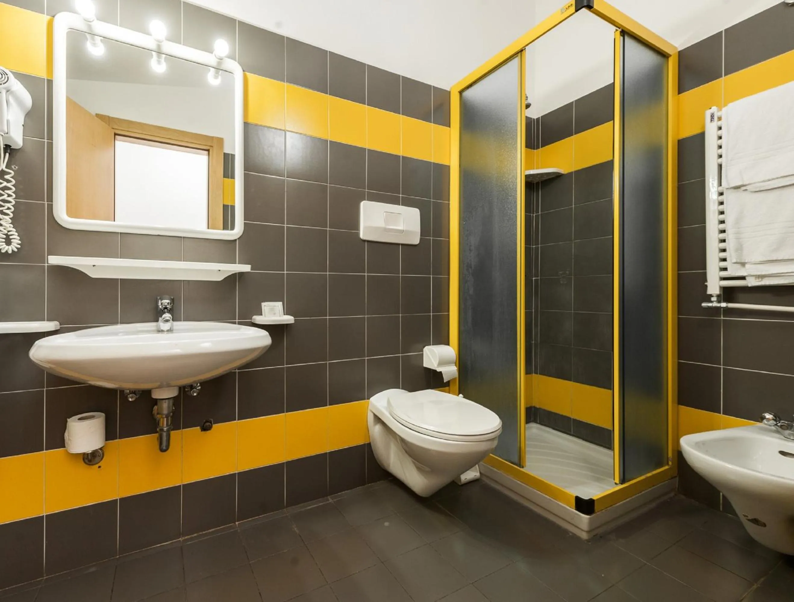 Bathroom in Club Hotel e Residence La Vela