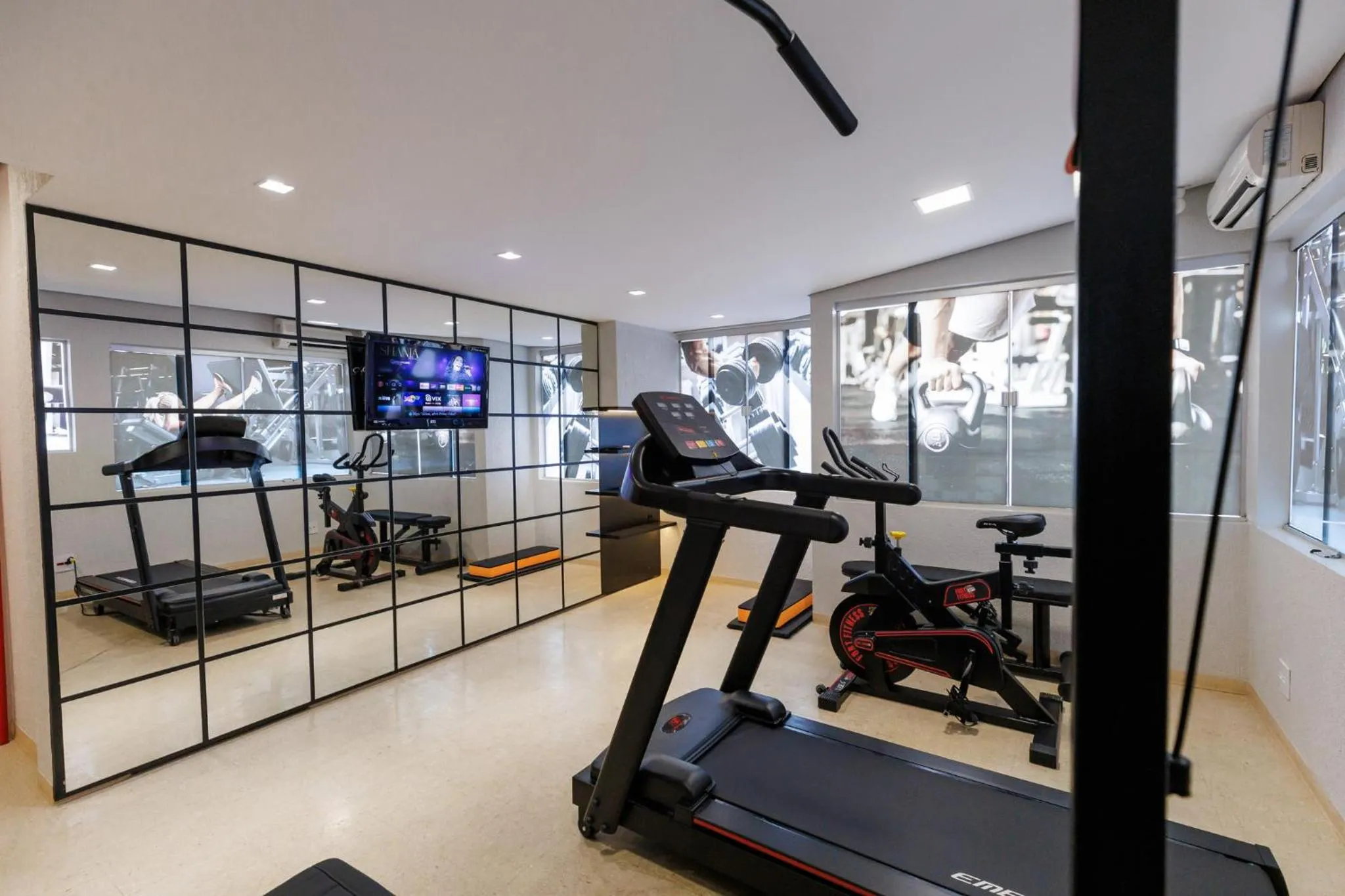 Fitness centre/facilities in Tonello Business Hotel