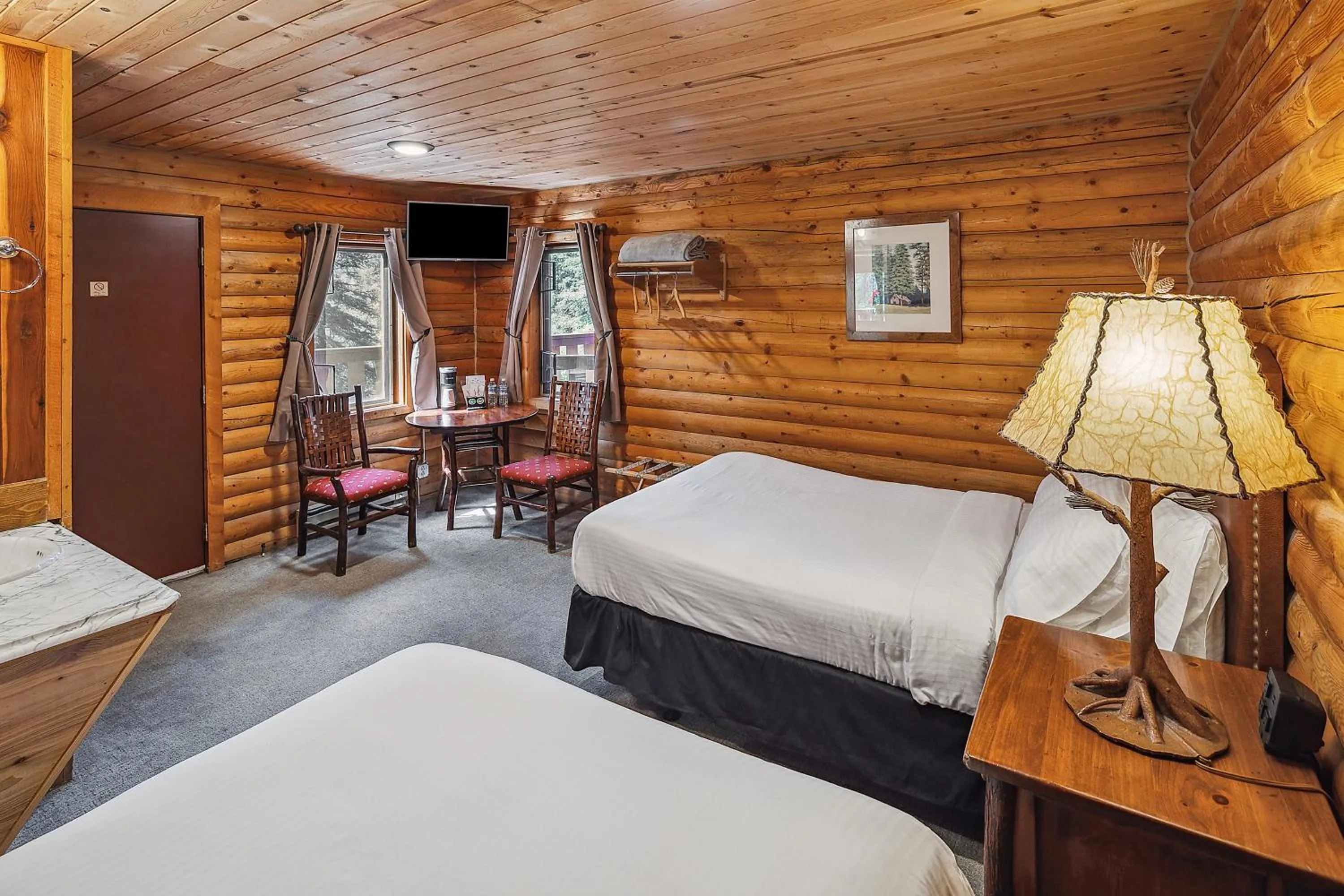 Bed in Denali Crow's Nest Cabins