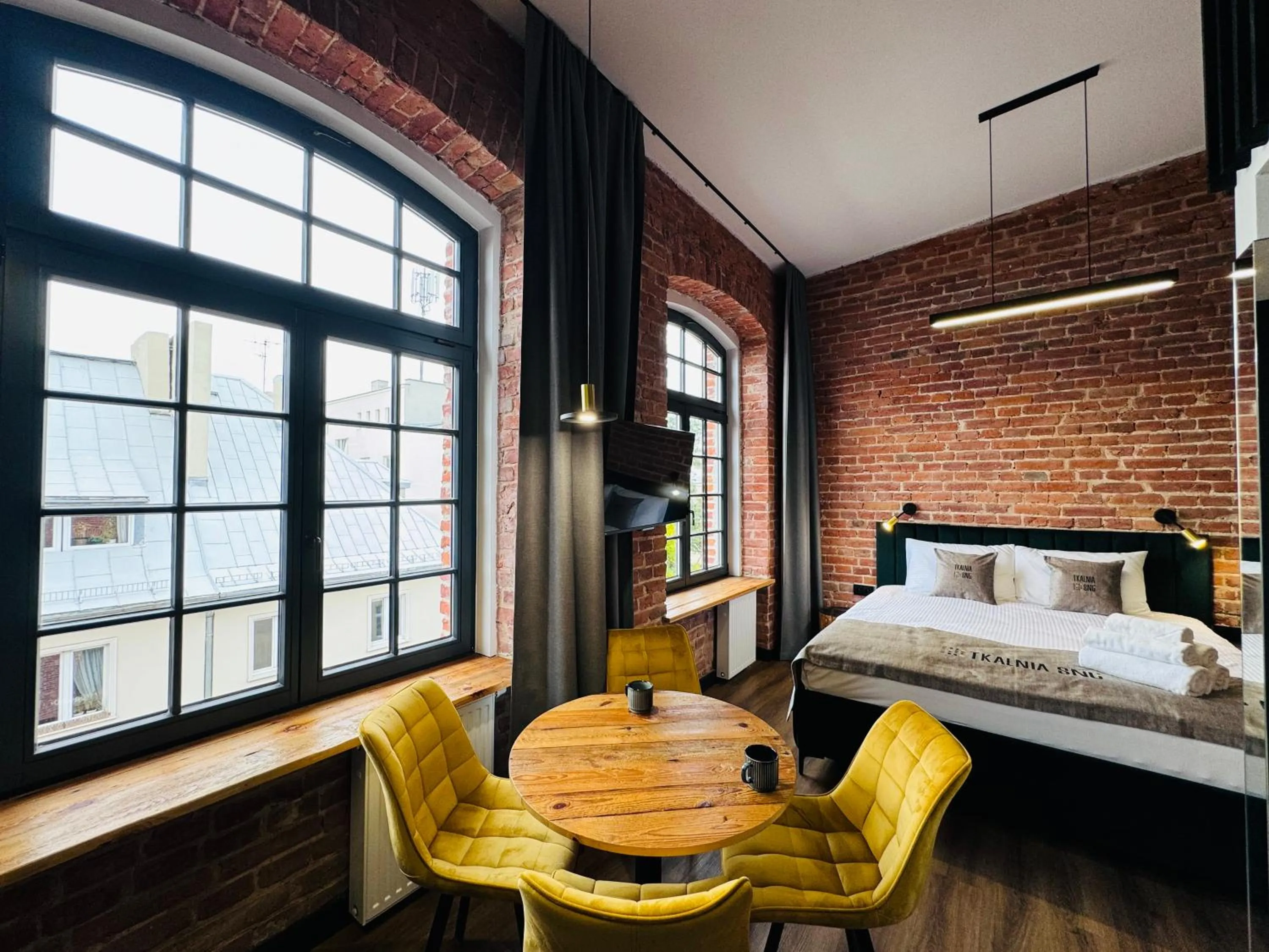 Seating area, Bed in Tkalnia Snu