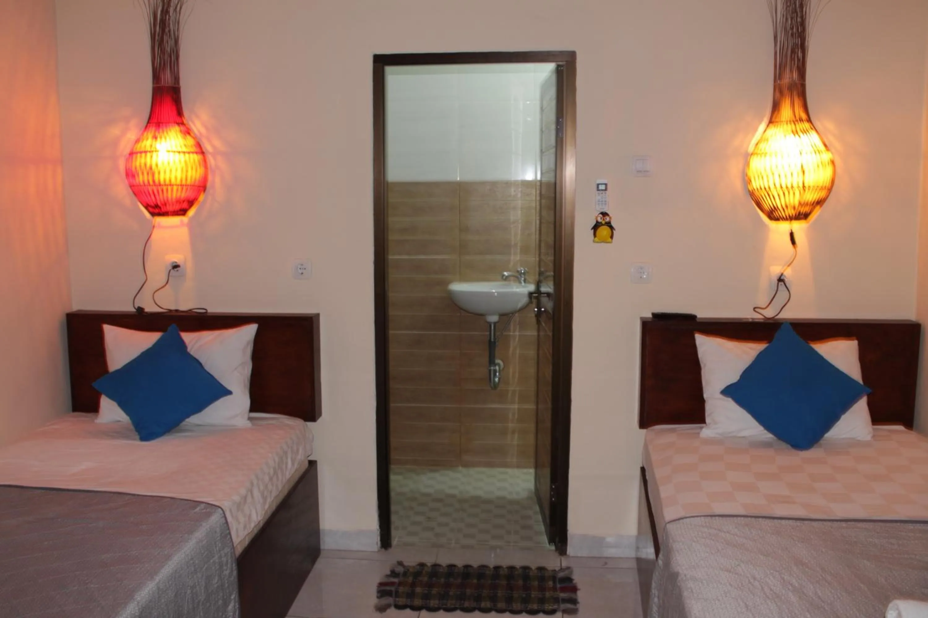 Bed in Chillin Kuta Homestay