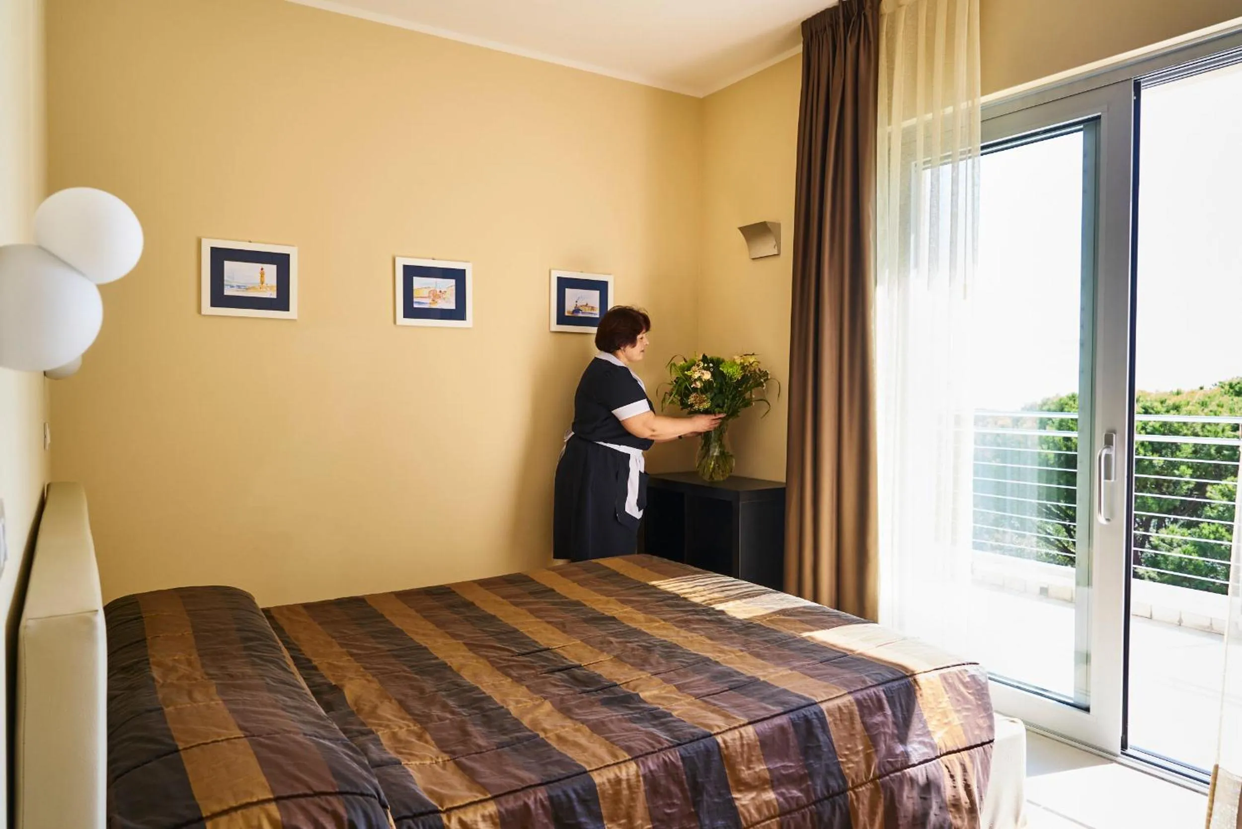 Bed in Aparthotel La Pineta