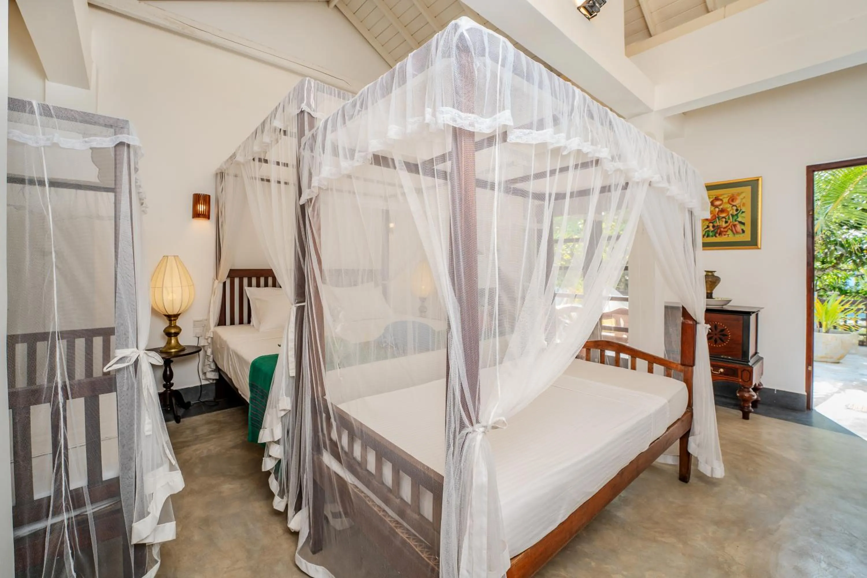 Bed in Wasantha Garden Hotel Restaurant & Ayurvedic Treatment