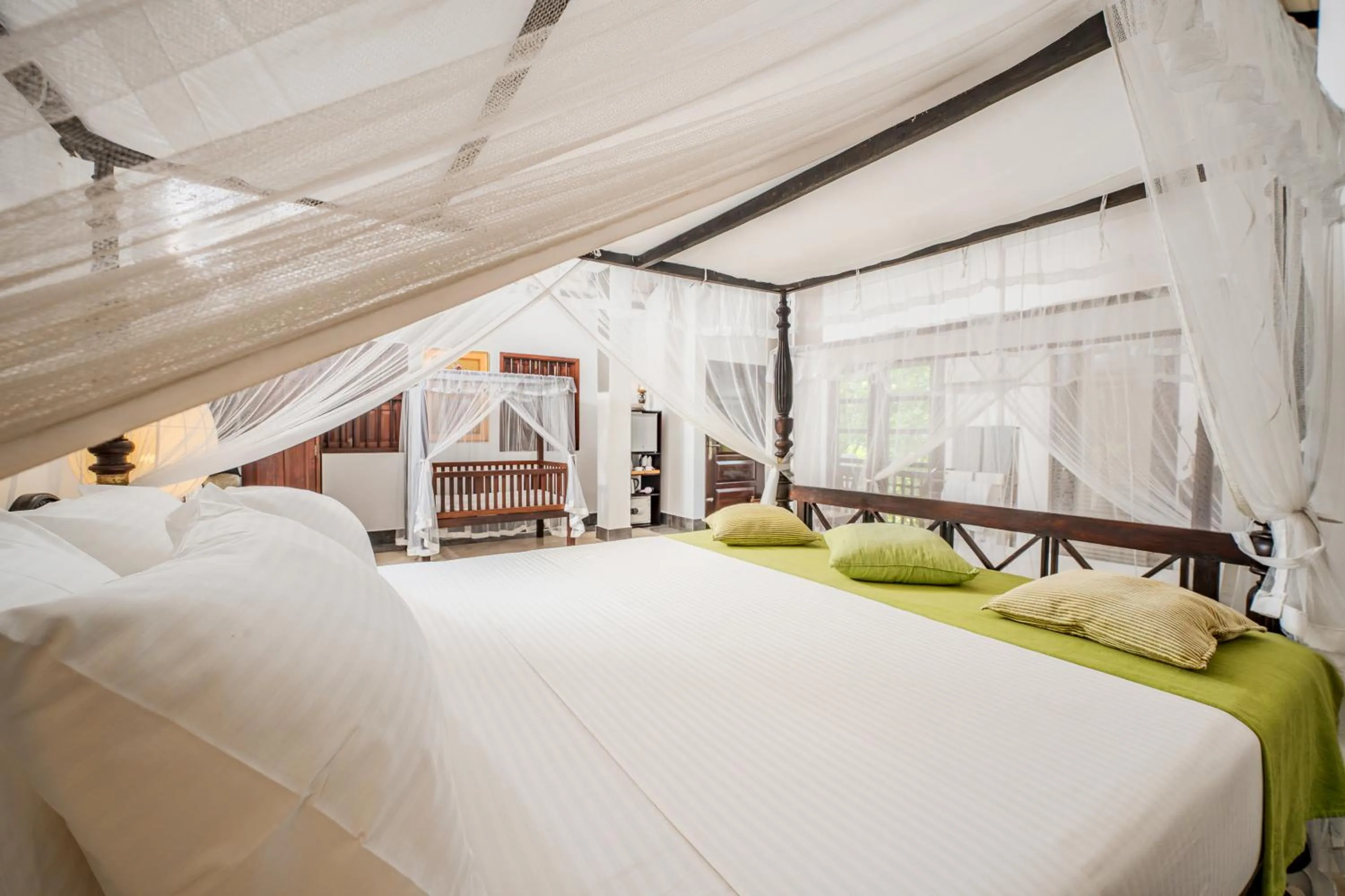 Bed in Wasantha Garden Hotel Restaurant & Ayurvedic Treatment