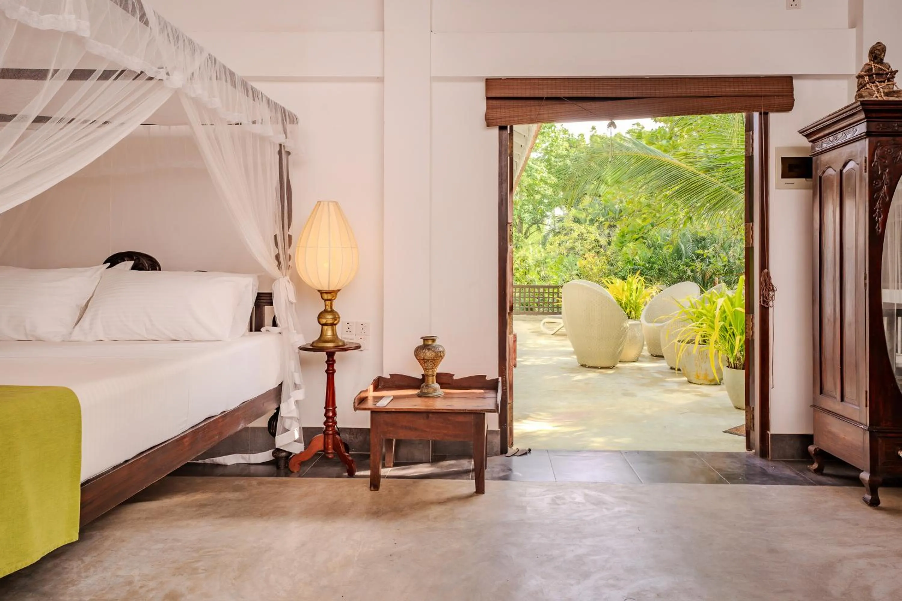 Bed in Wasantha Garden Hotel Restaurant & Ayurvedic Treatment