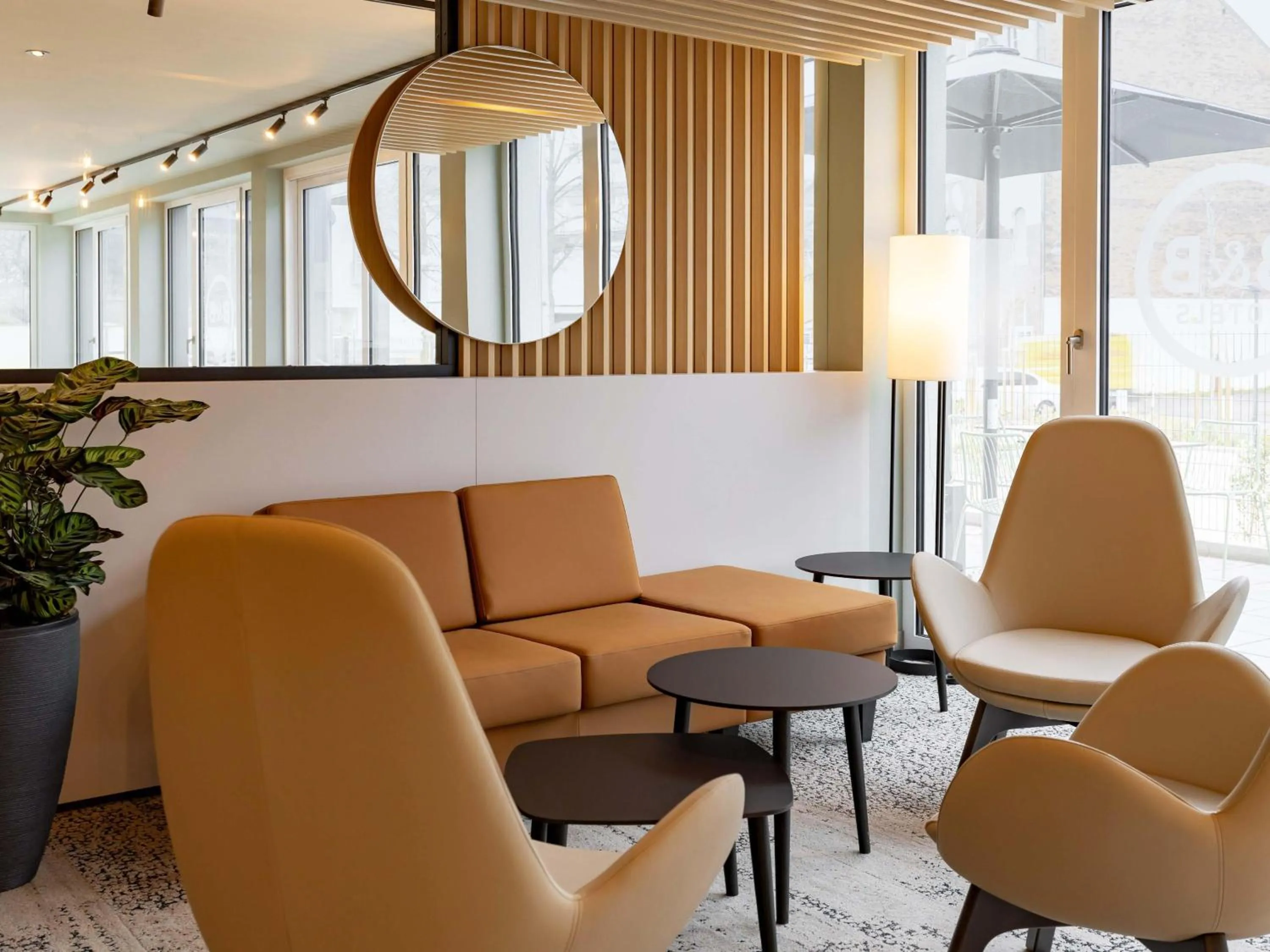 Lobby or reception in B&B HOTEL Idar-Oberstein