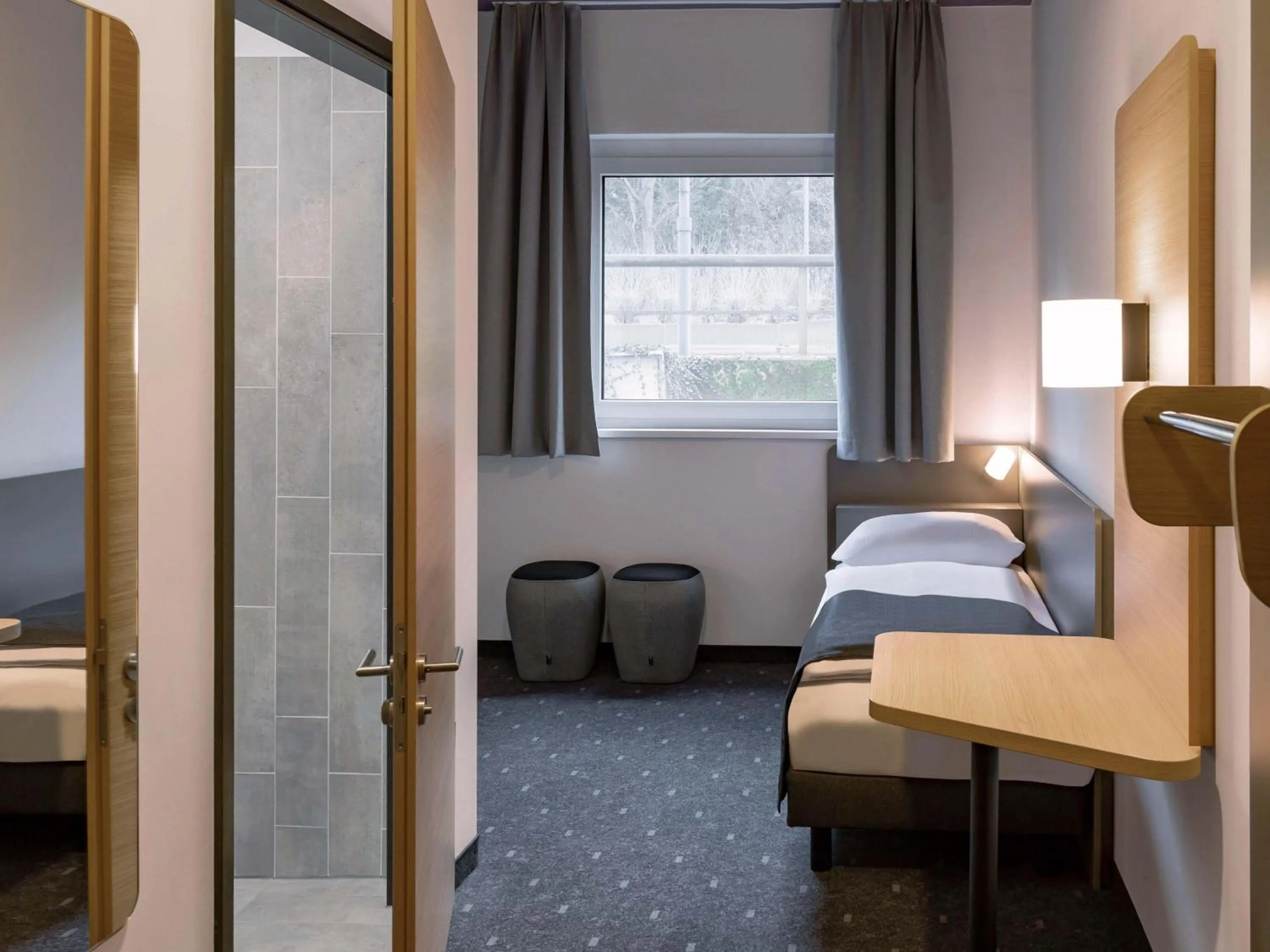 Photo of the whole room, Bed in B&B HOTEL Idar-Oberstein